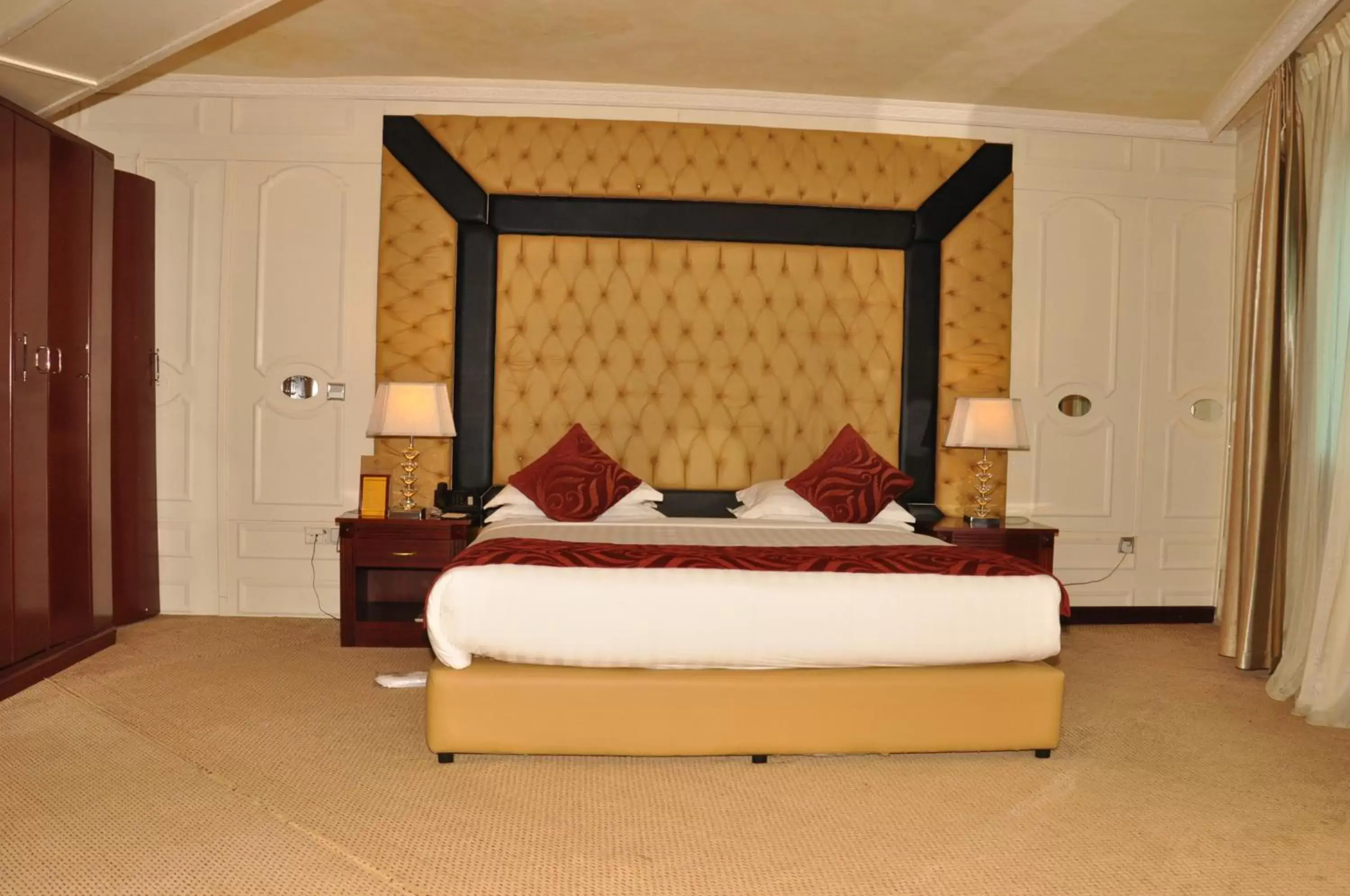 Bed in Inter Luxury Hotel