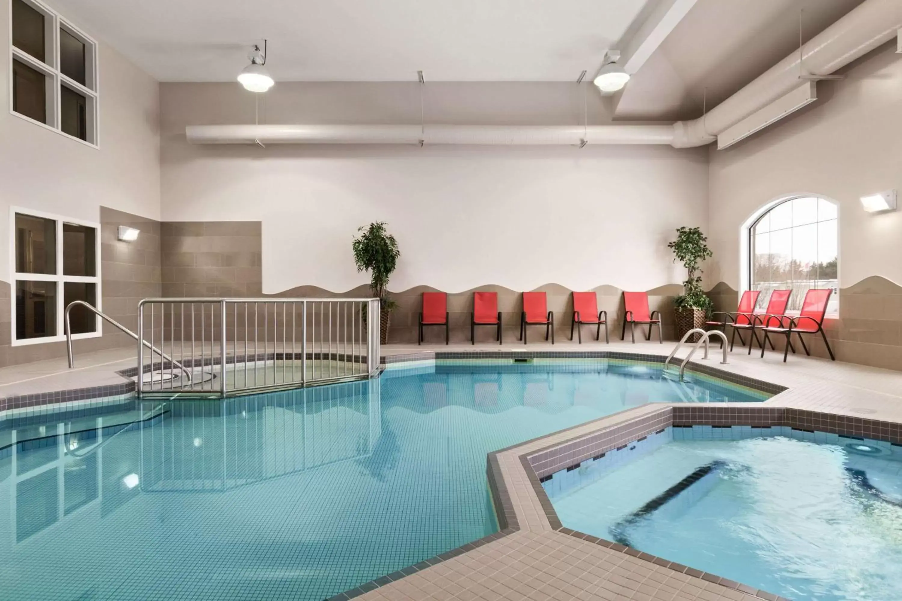 On site, Swimming Pool in Days Inn & Suites by Wyndham Brandon