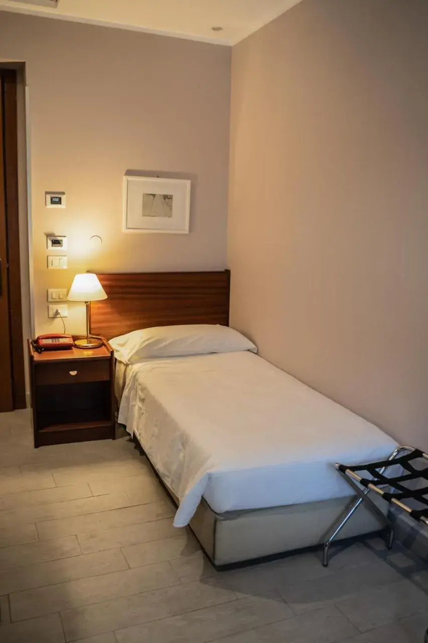 Bed in Hotel Mediterraneo