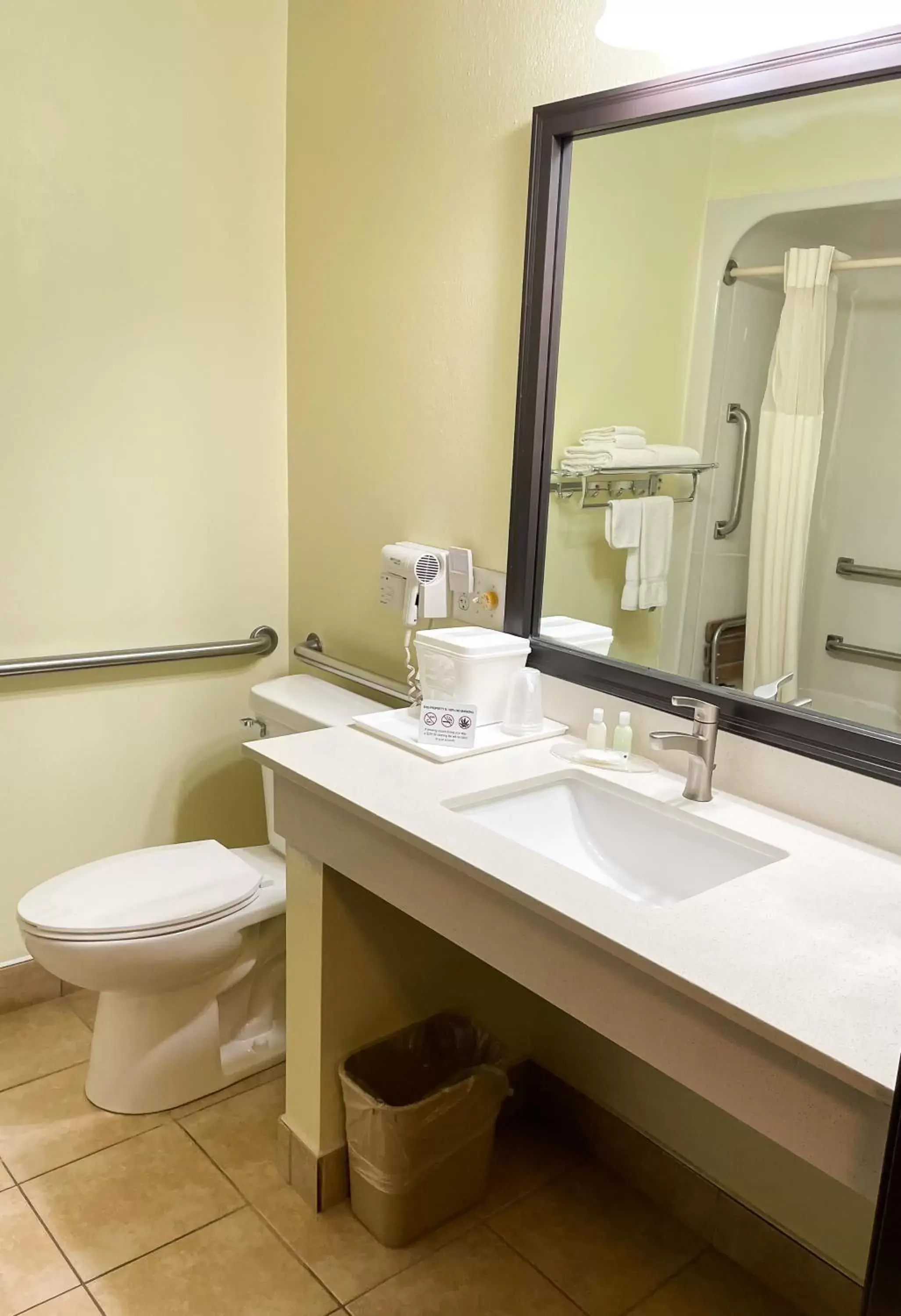 Bathroom in Hudson Inn & Suites