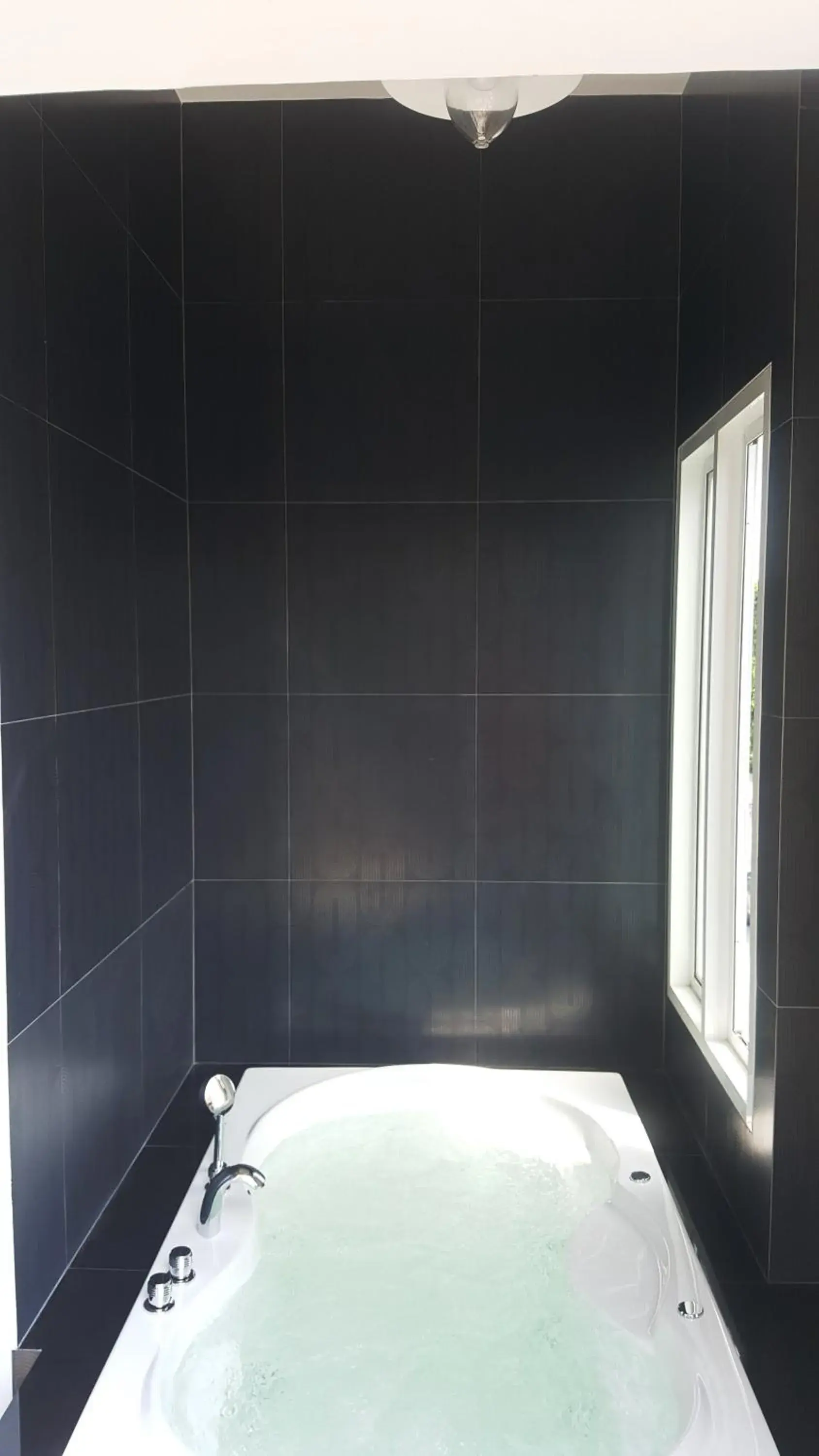 Bathroom in Ricco Suvarnabhumi