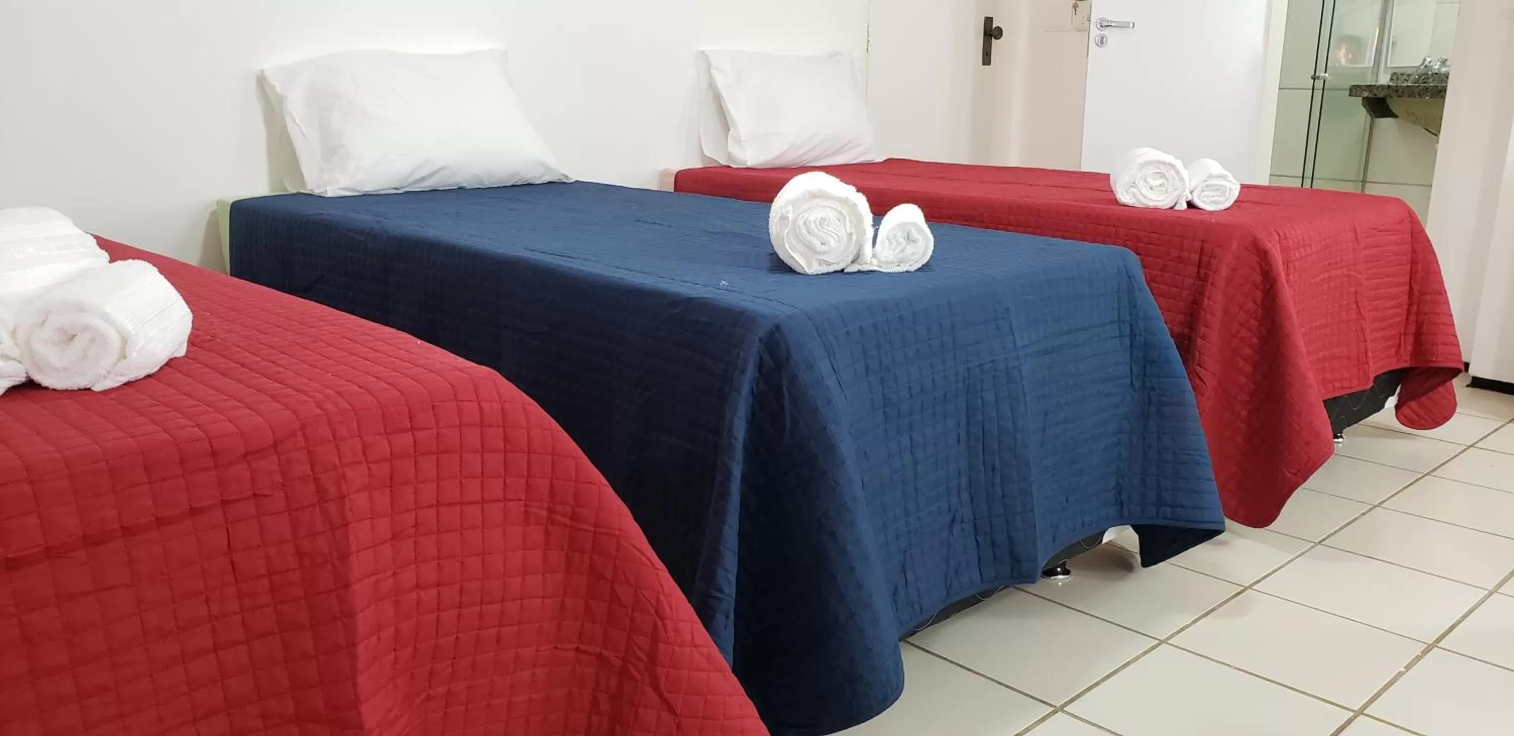 Bed in LIVE IN FORTALEZA HOTEL