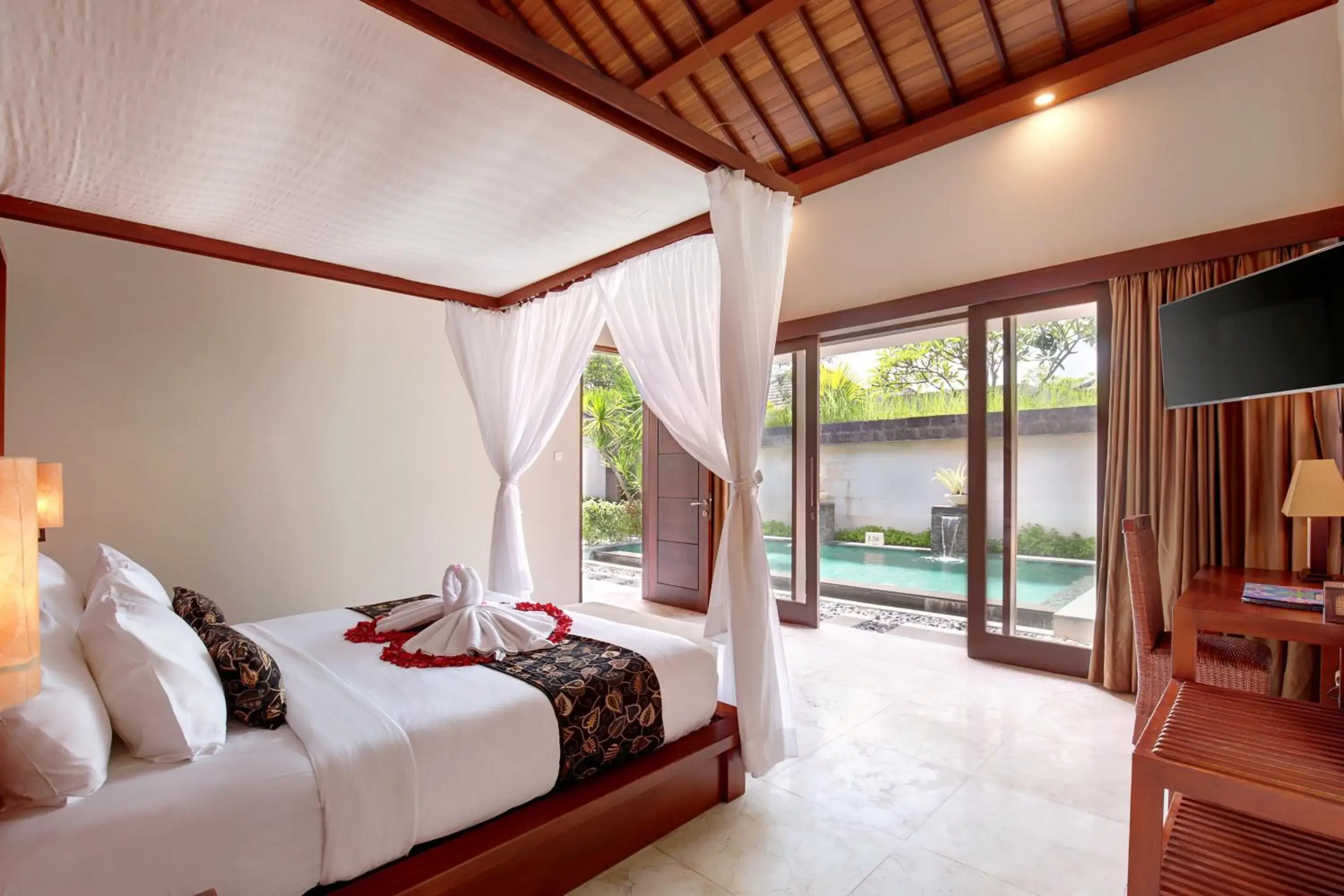 Bed in Lumbini Luxury Villas and Spa