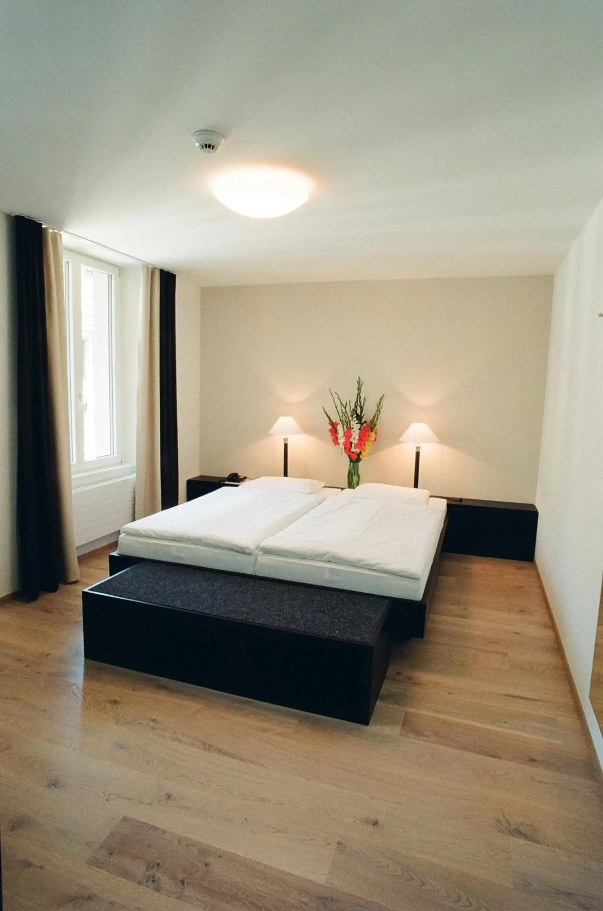 Bed in Hotel Alpina Luzern