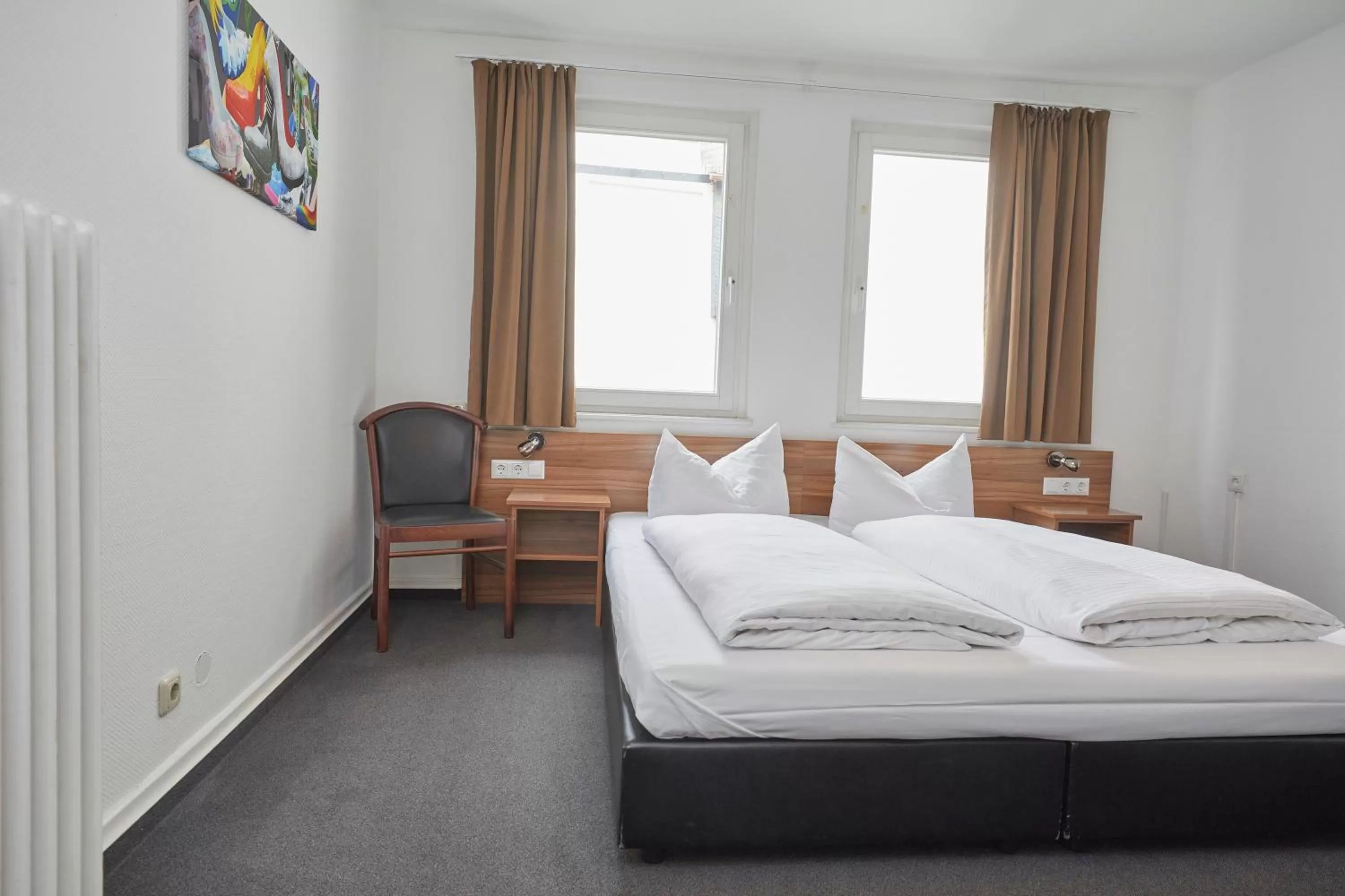 Bed in Hotel Schlemmer Das familäre Altstadt - Hotel mit Herz