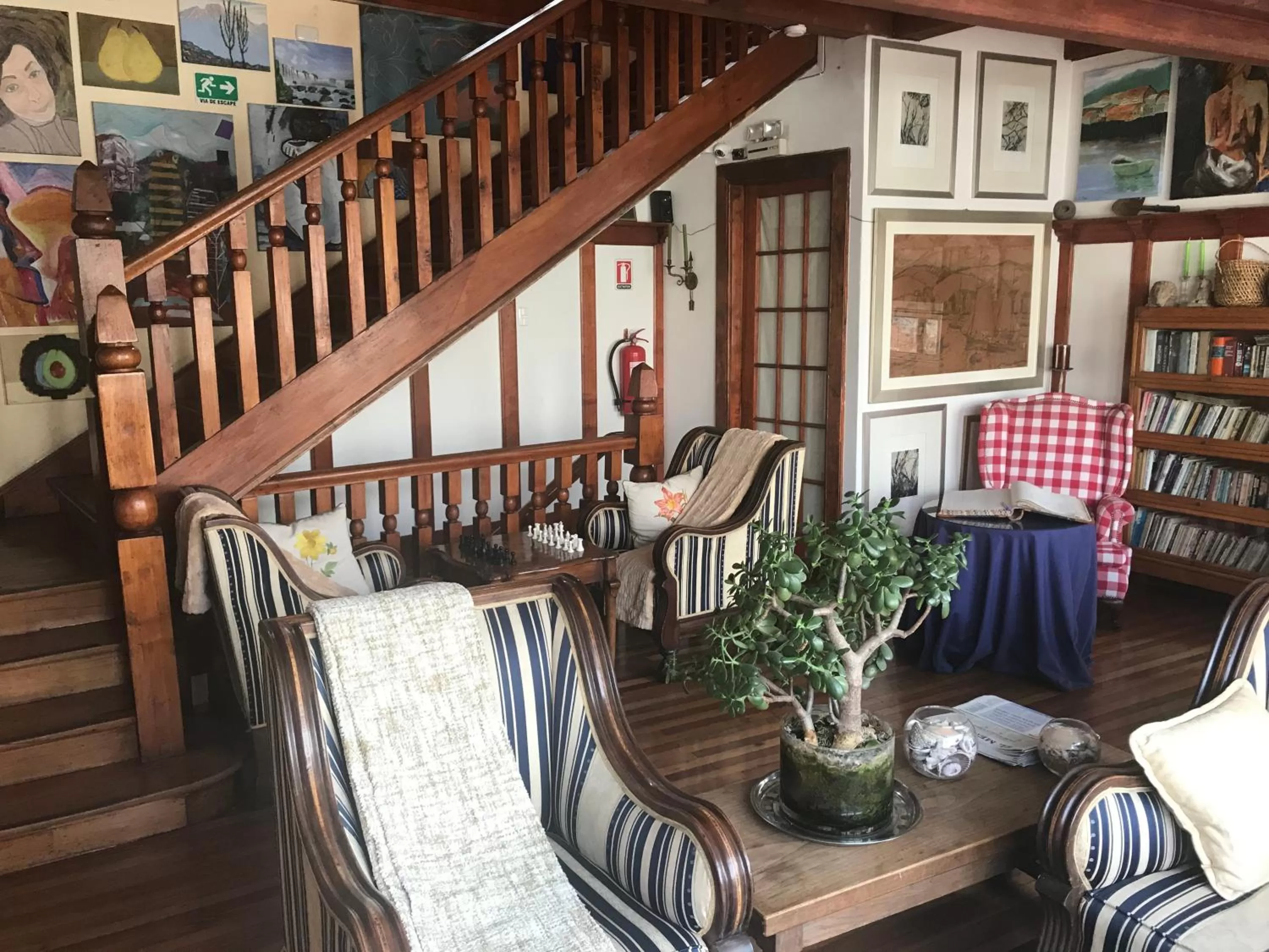 Communal lounge/ TV room in Chocolate Manor House Hotel Boutique