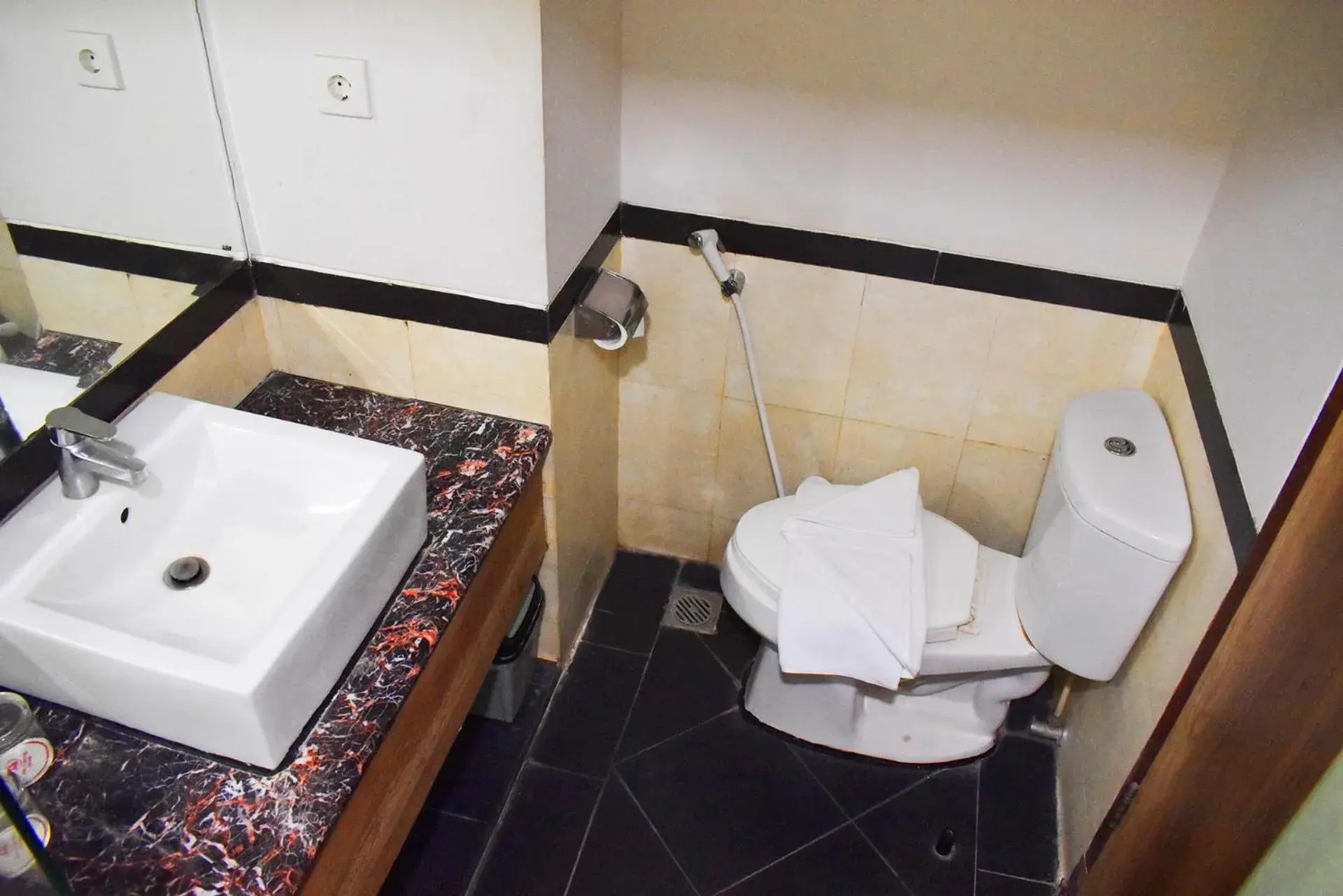 Bathroom in Abadi Hotel Malioboro Yogyakarta by Tritama Hospitality