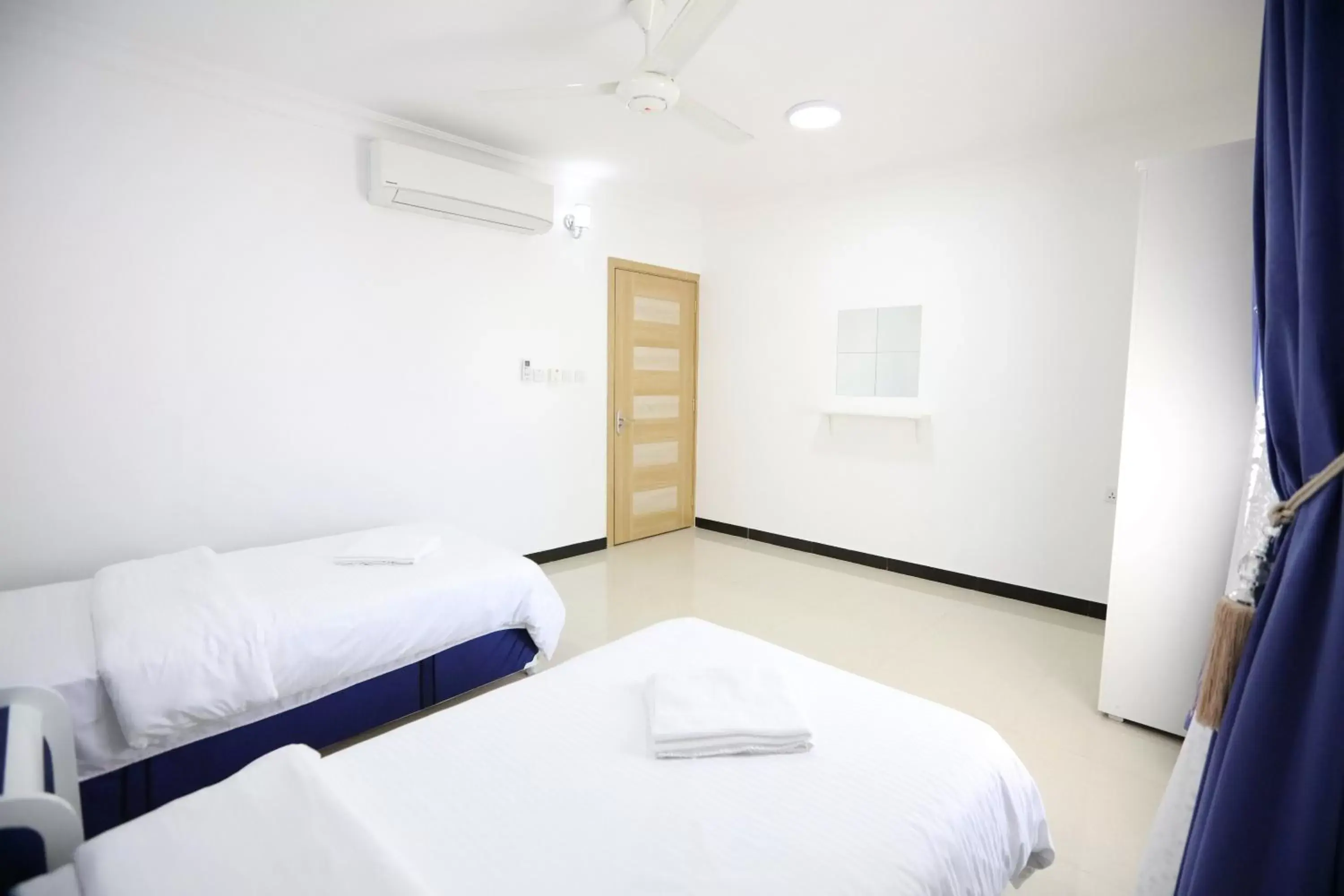 Bed in Al Rayyan Hotel Apartments Muscat