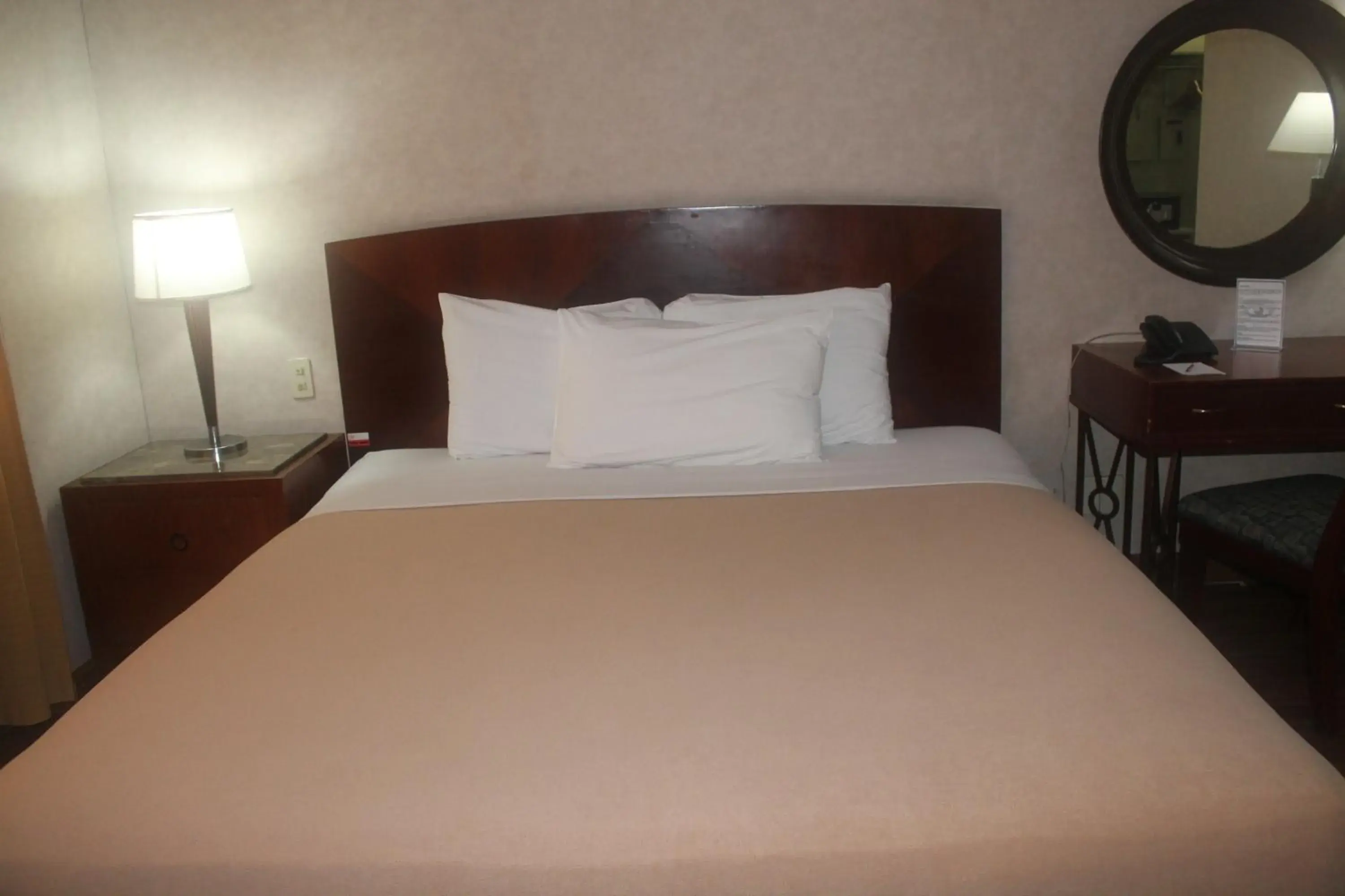 Bed in Pearl Manila Hotel