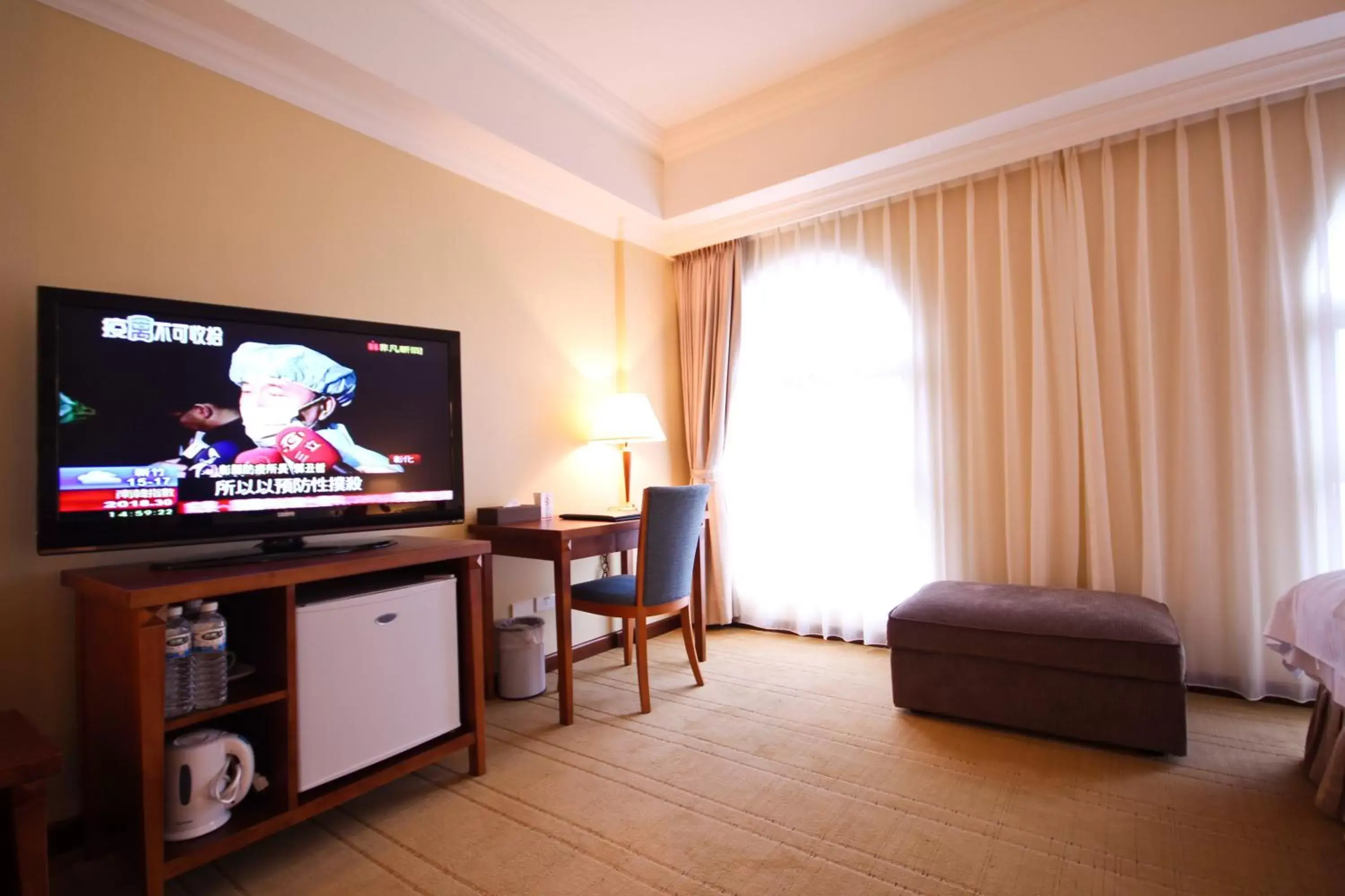 Photo of the whole room, TV/Entertainment Center in Grand Boss Hotel