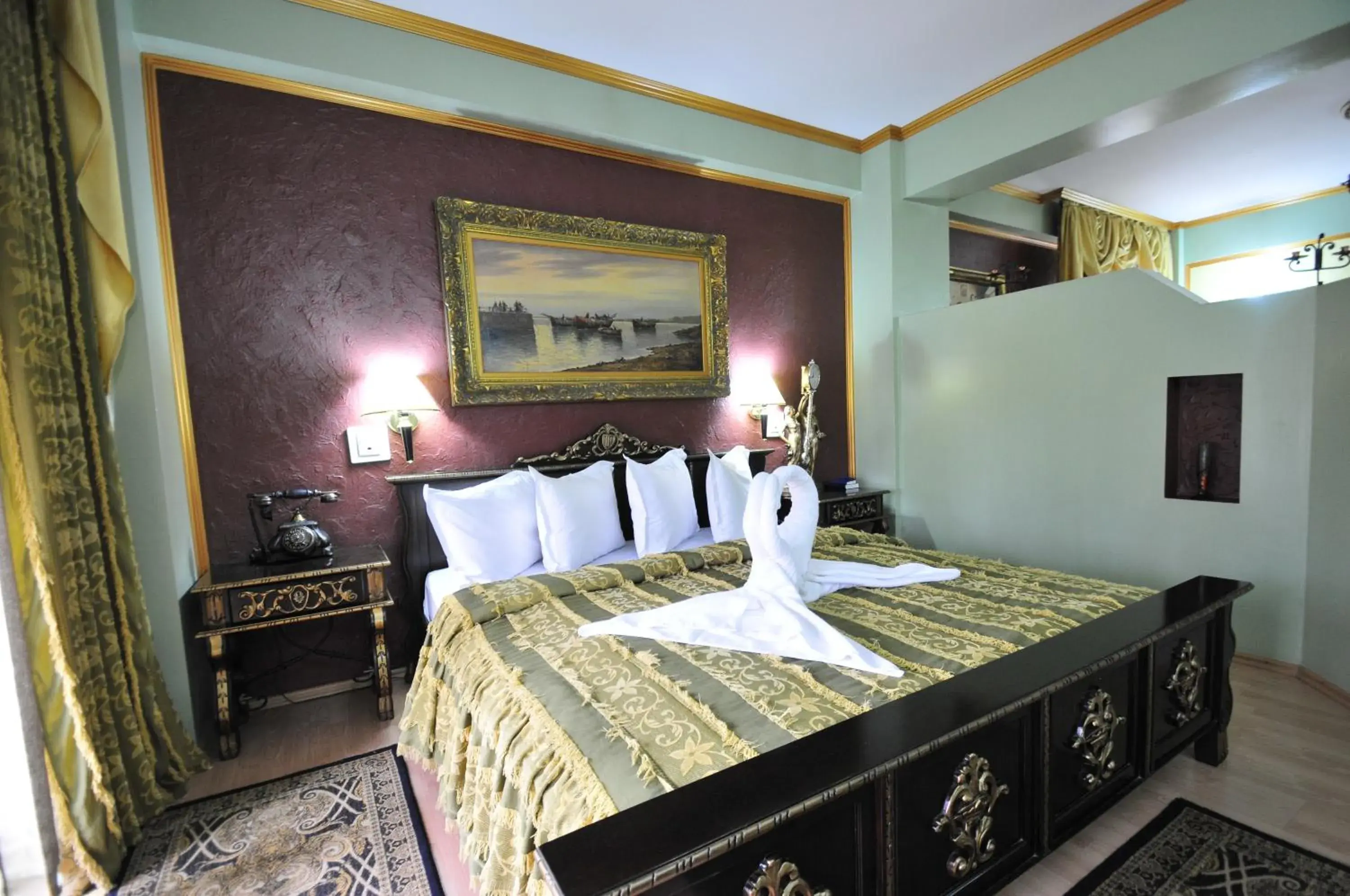 Bed in Ambassador Hotel