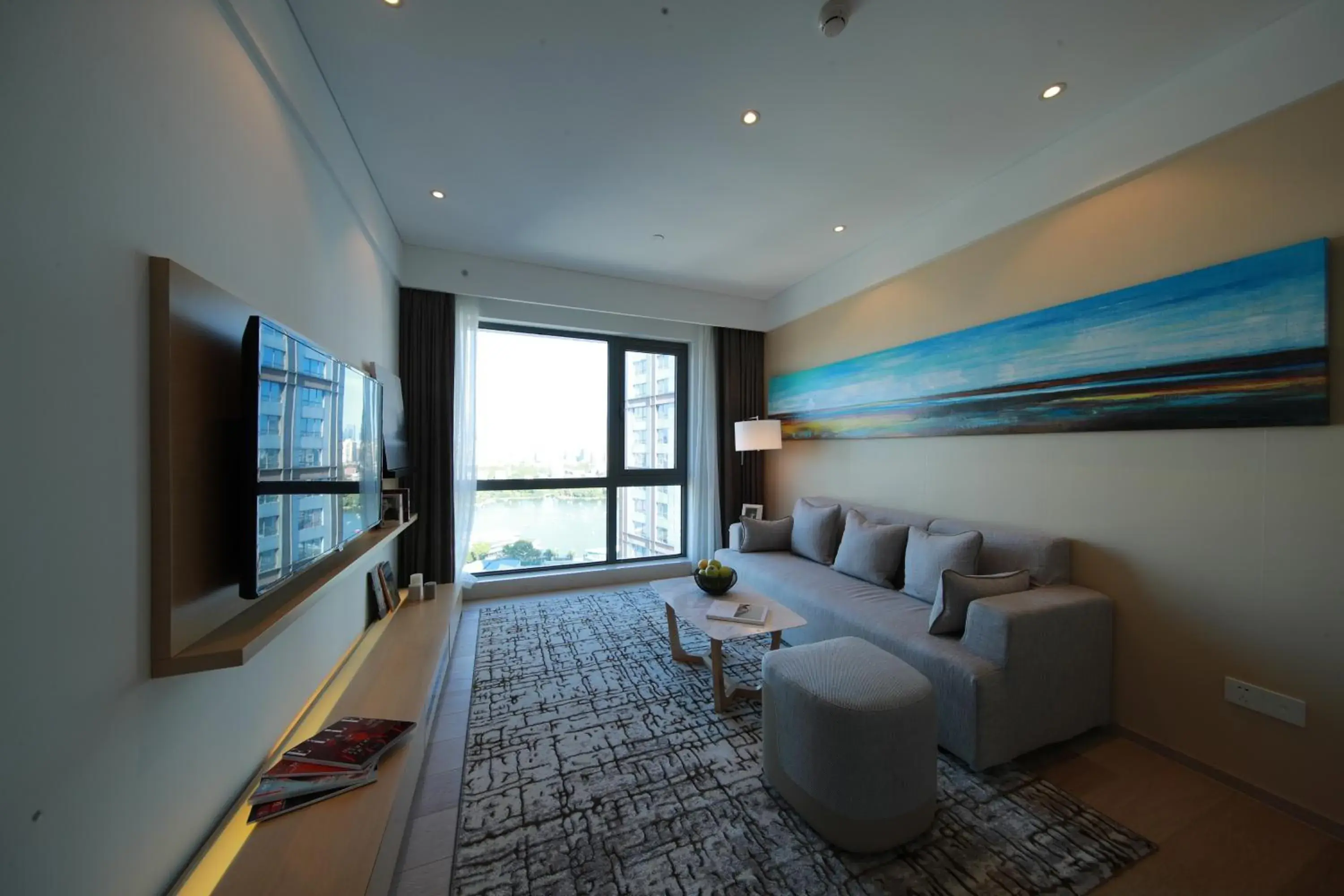 Living room in Sincere Residence Changfeng - Changfeng Ecological Business District