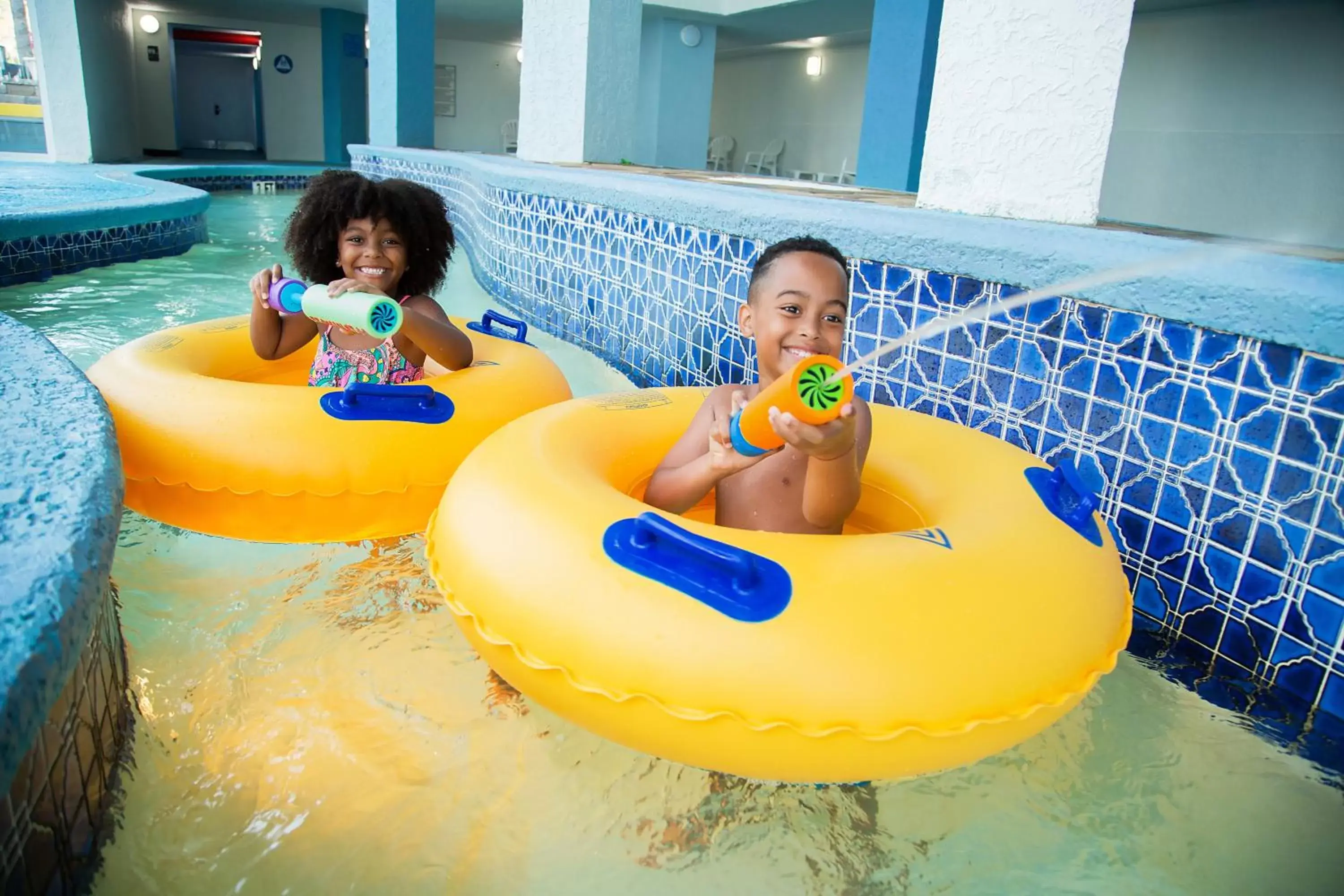 Swimming pool, Children in Ocean Escape Condos