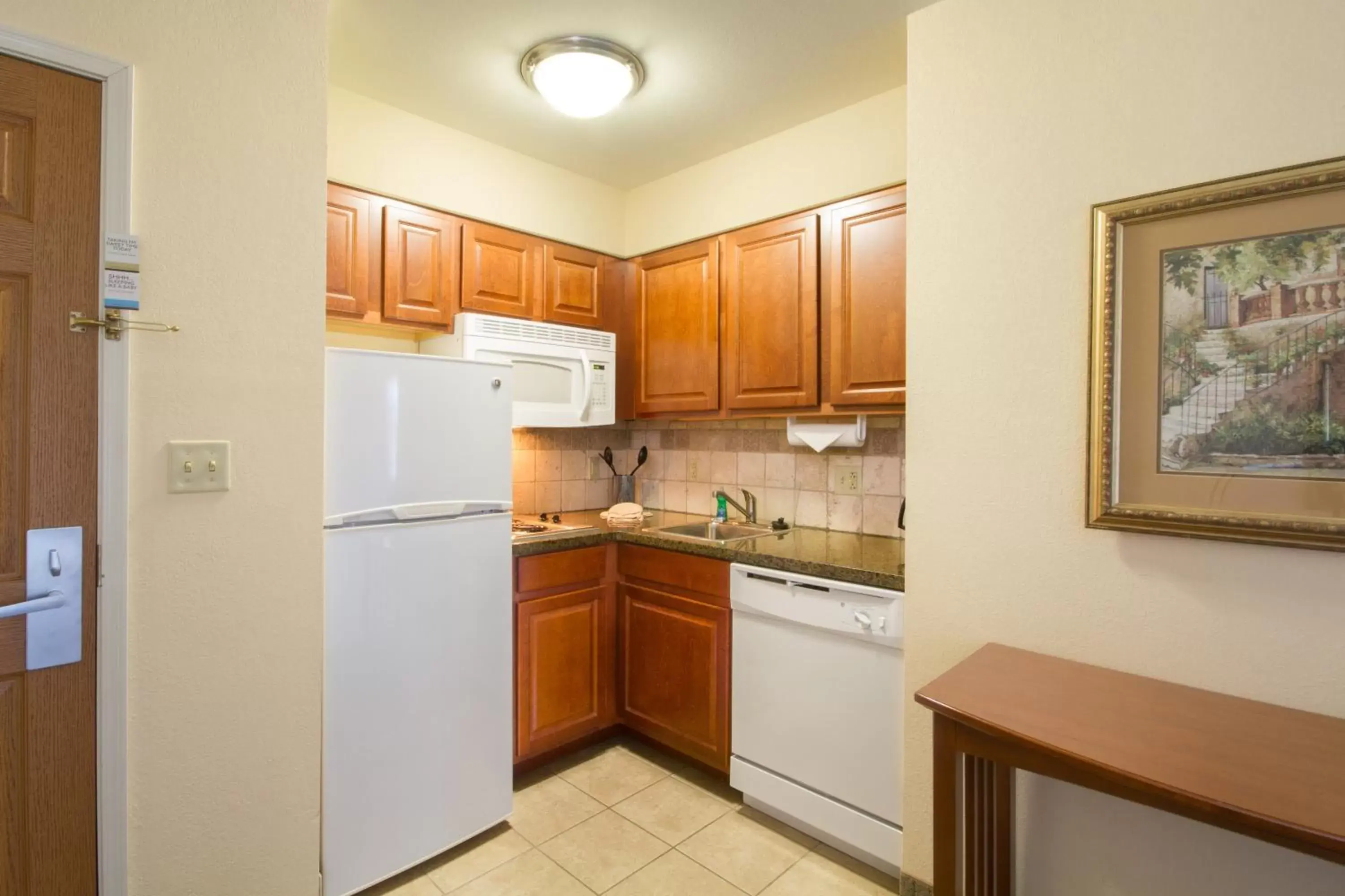 Photo of the whole room, Kitchen/Kitchenette in Staybridge Suites Buffalo, an IHG Hotel