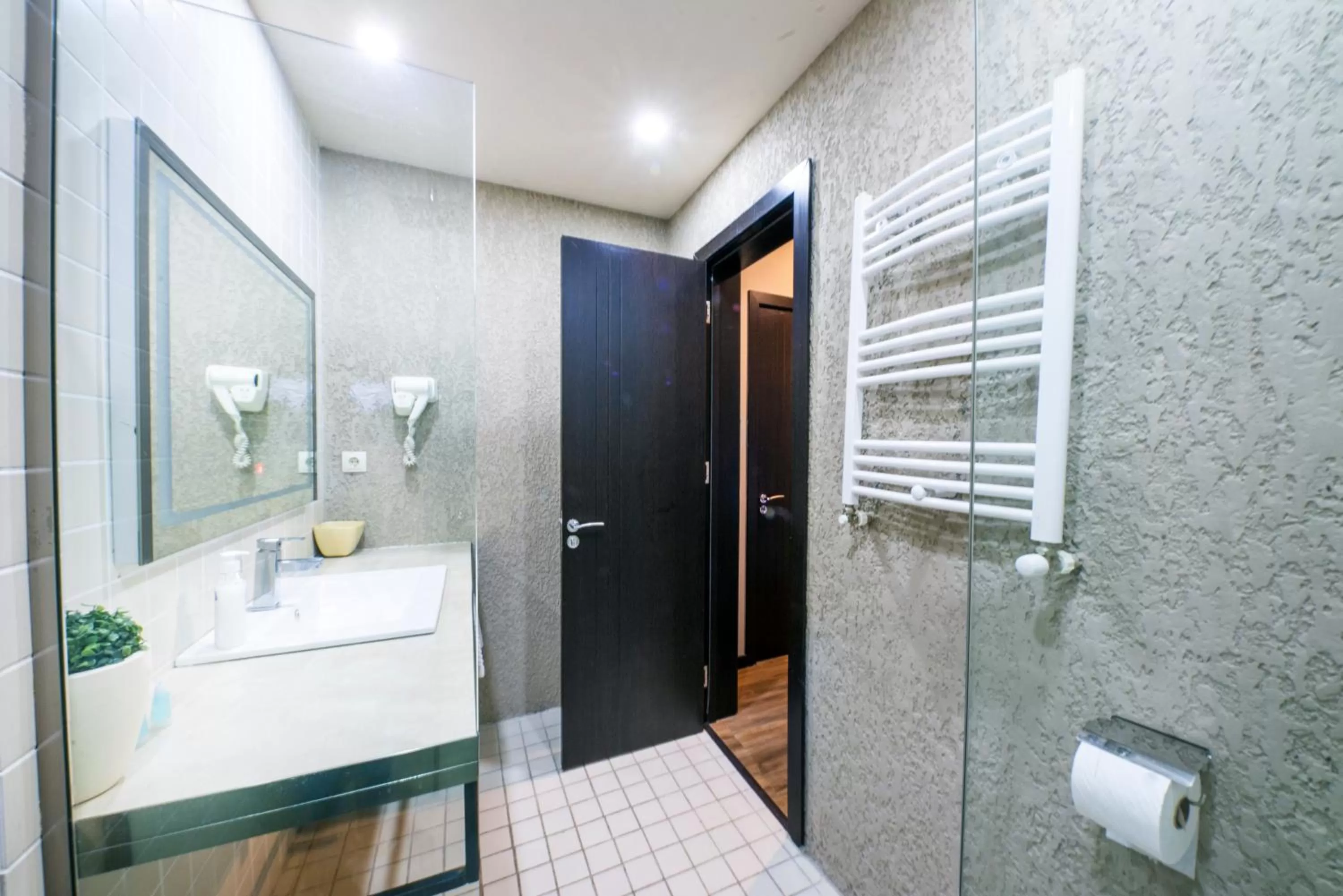 Bathroom in Sani Apart Hotel