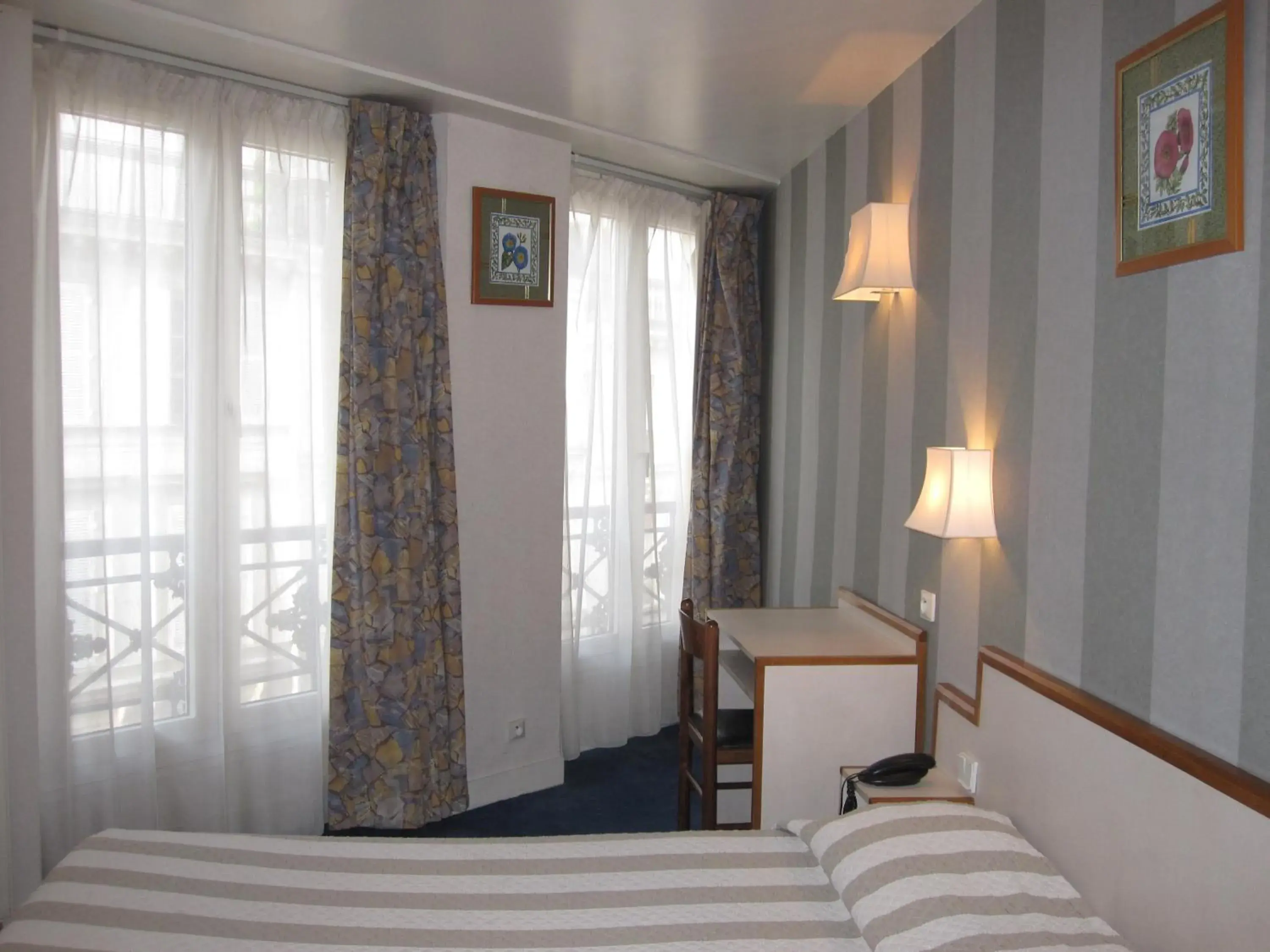 Photo of the whole room, Bed in Hotel Royal Bergère Photo of the whole room, Bed in Hotel Royal Bergère