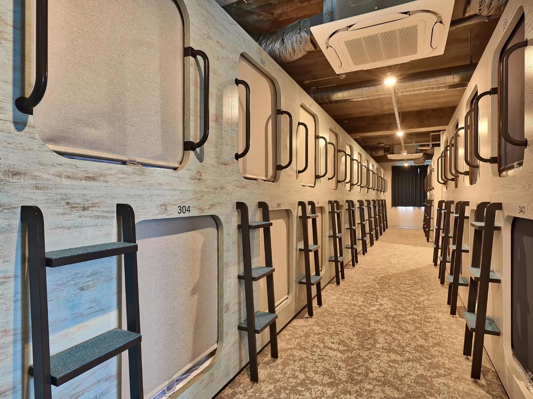 Bed in CABIN&HOTEL ReTIME