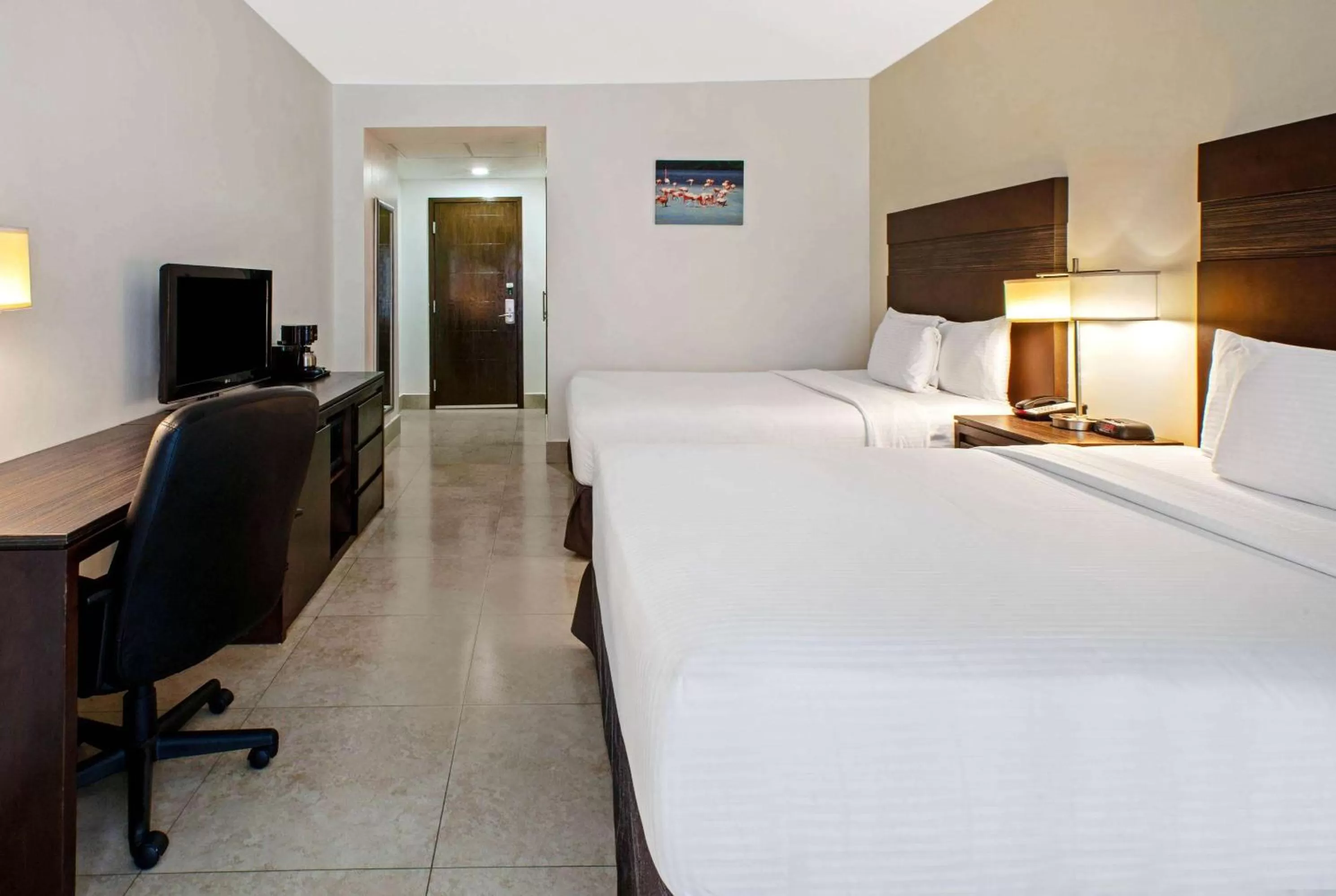 Photo of the whole room, Bed in Wyndham Garden Cancun Downtown