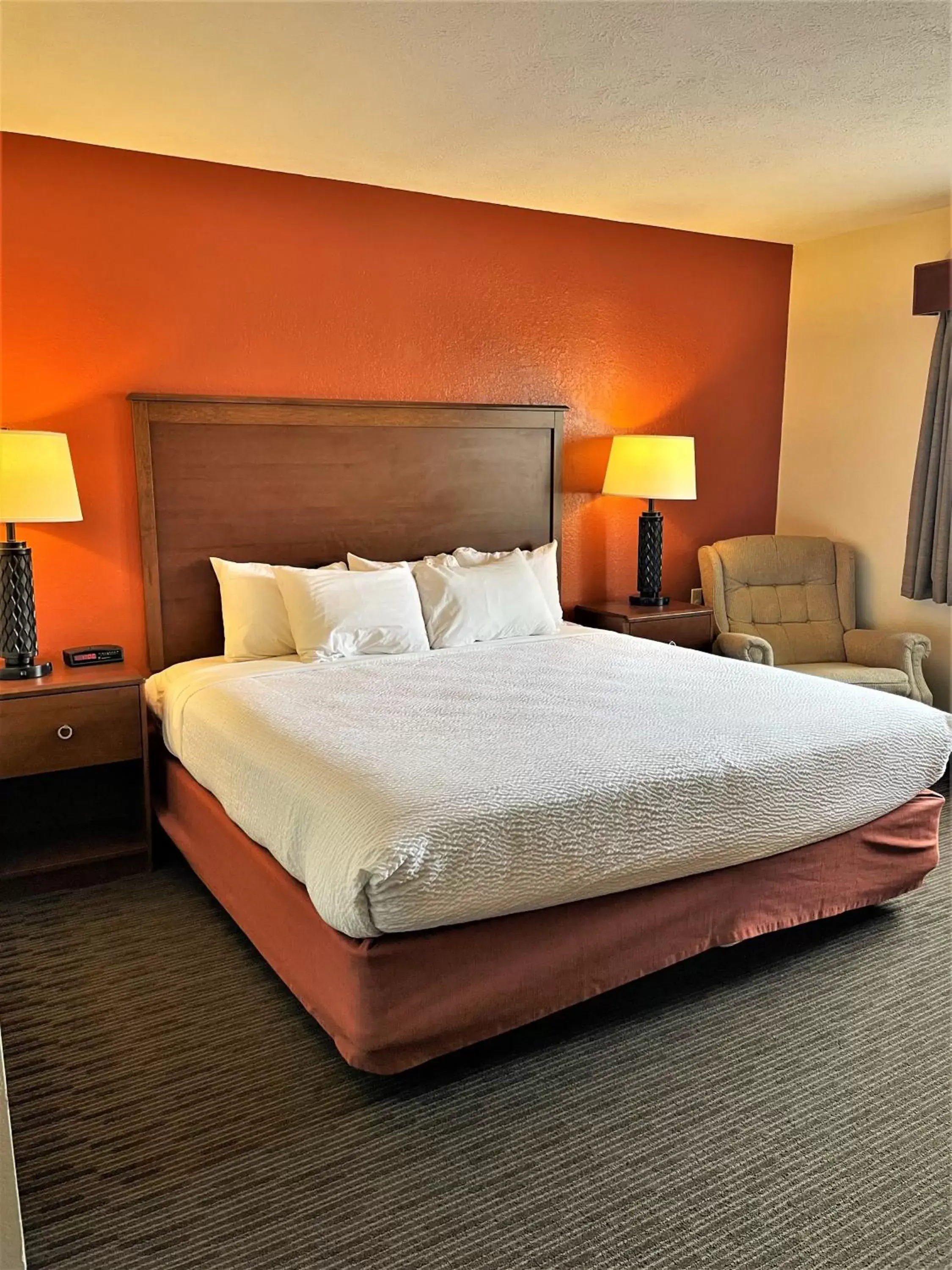 Bed in AmericInn by Wyndham Petoskey