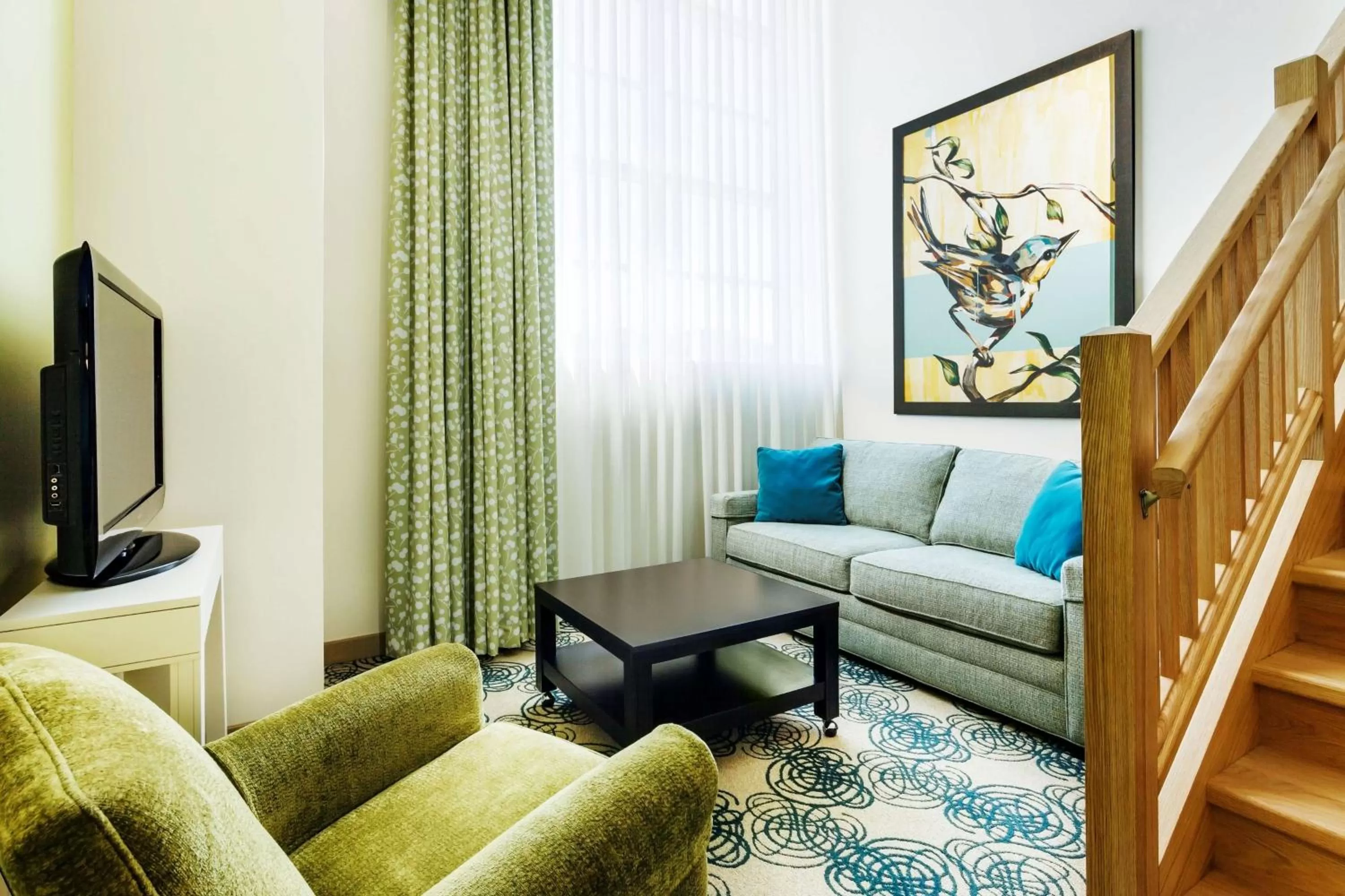 Living room in Hotel Skyler Syracuse, Tapestry Collection by Hilton