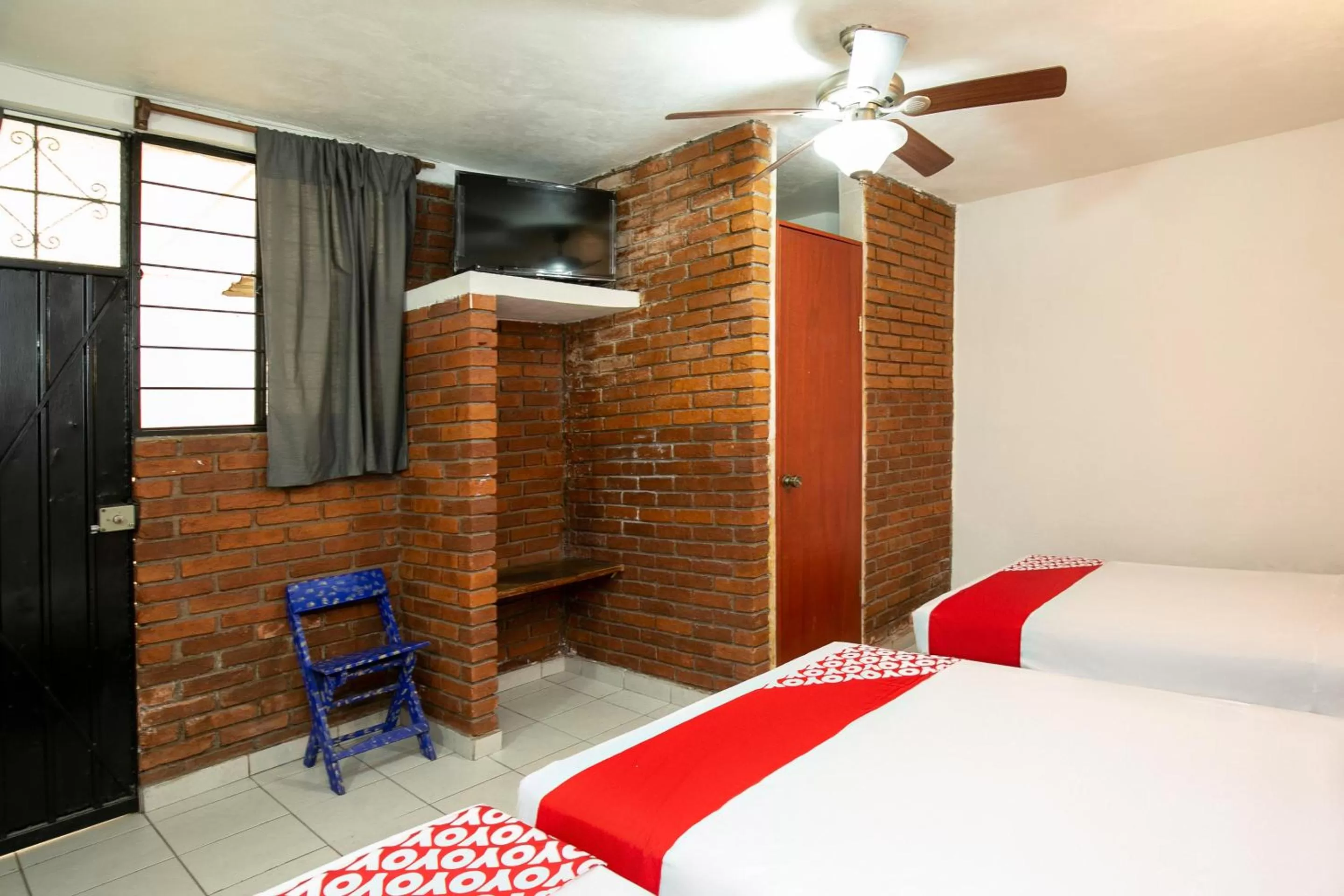 Bedroom in OYO La Casita