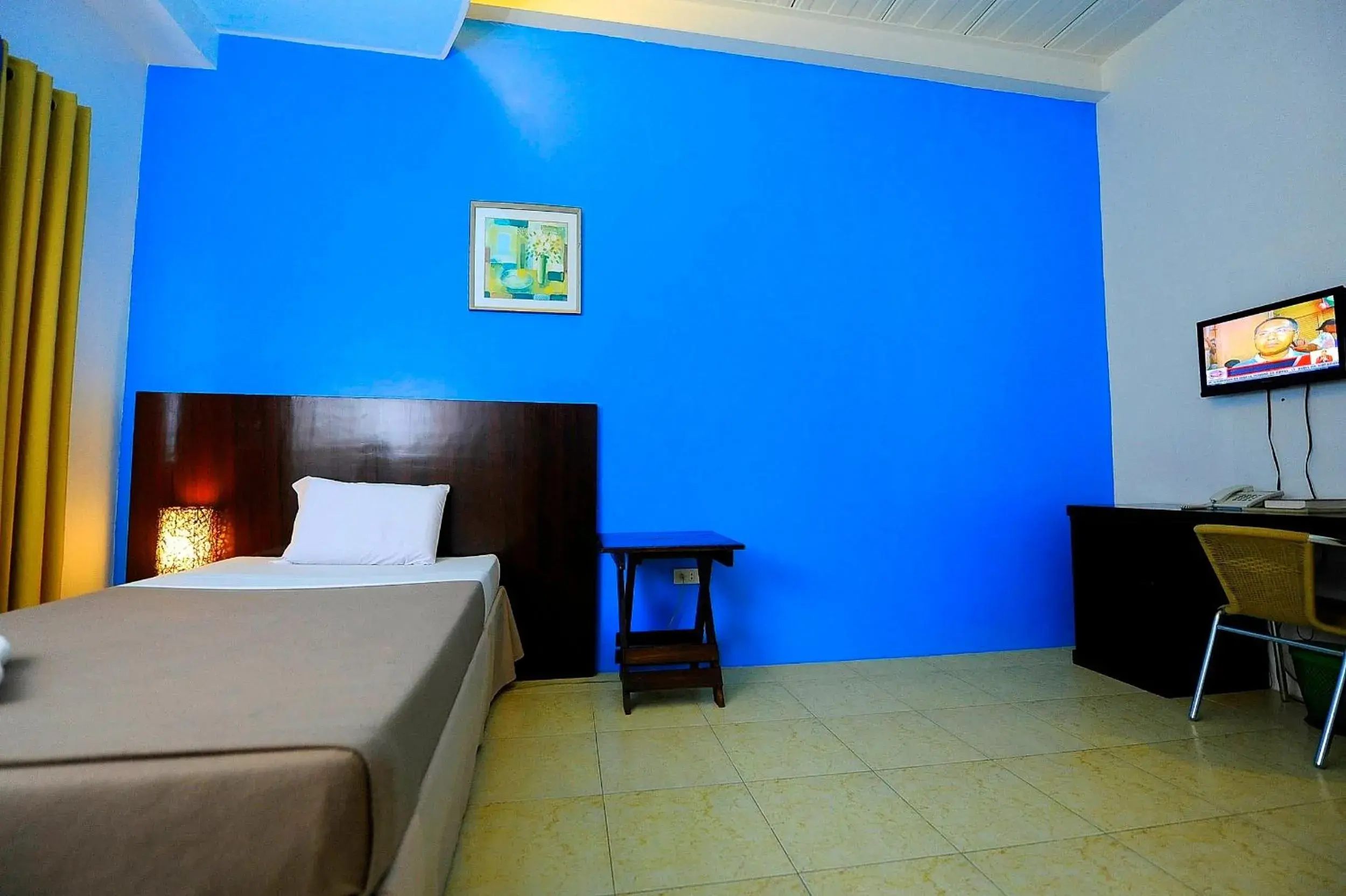 Photo of the whole room, Bed in First Pacific Inn Davao Photo of the whole room, Bed in First Pacific Inn Davao