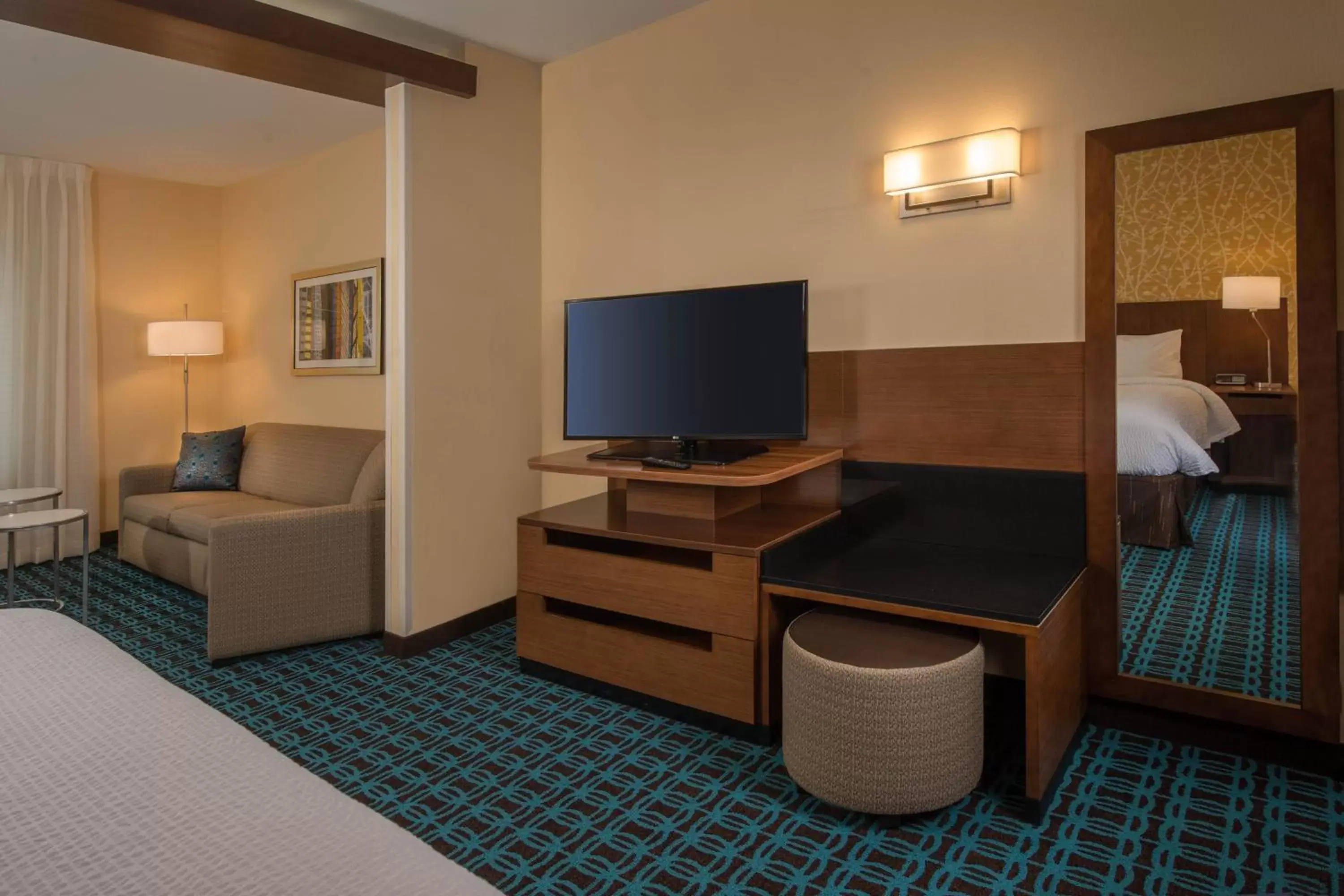 Photo of the whole room, TV/Entertainment Center in Fairfield Inn & Suites by Marriott Washington