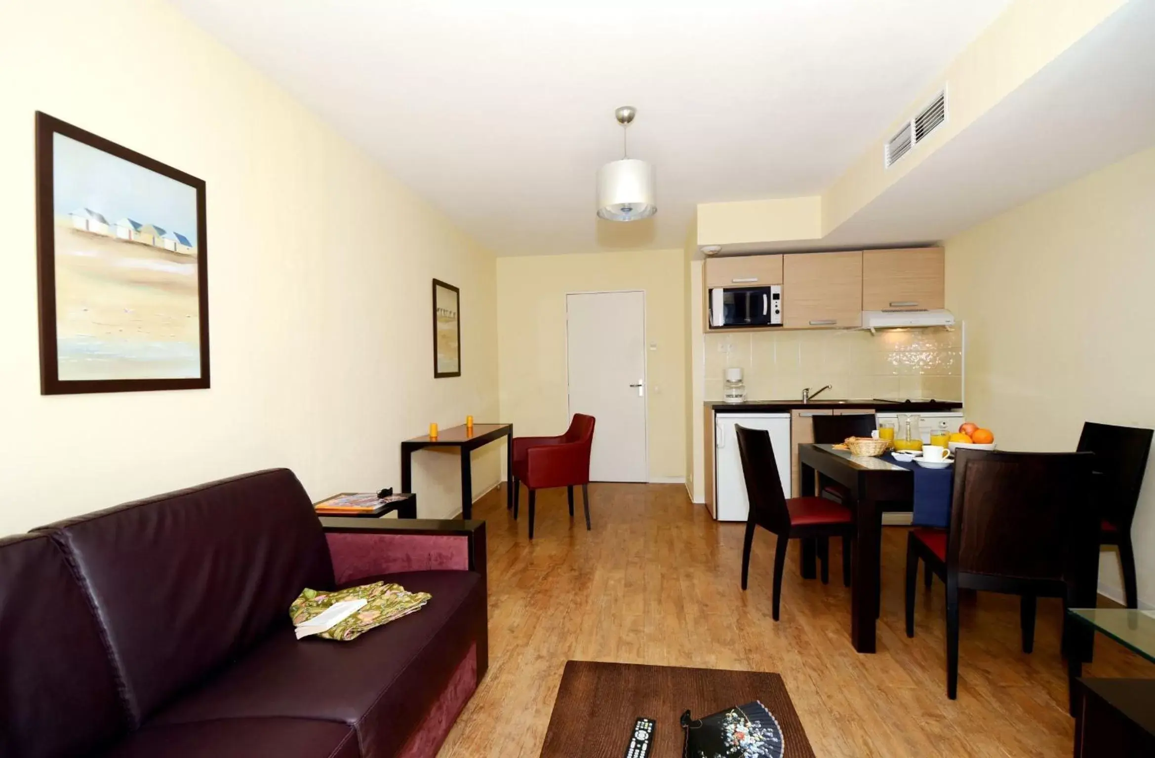 Living room in Appart Hotel Odalys City Antibes Olympe Living room in Appart Hotel Odalys City Antibes Olympe