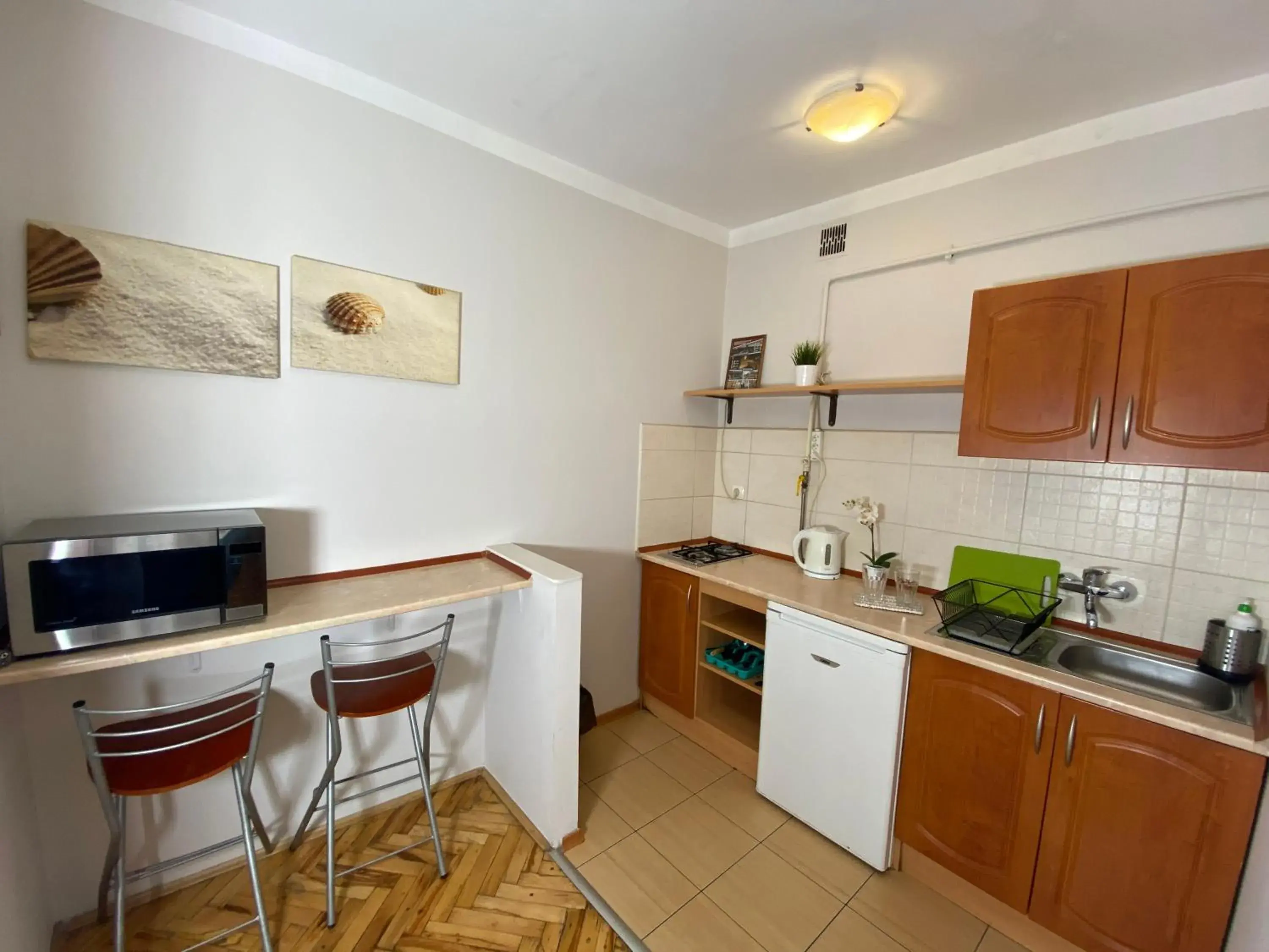 Kitchen/Kitchenette in P&J Tourist Apartments