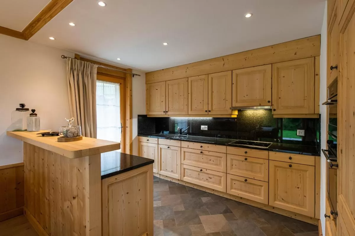 Communal kitchen in Chalet RoyAlp Hôtel & Spa