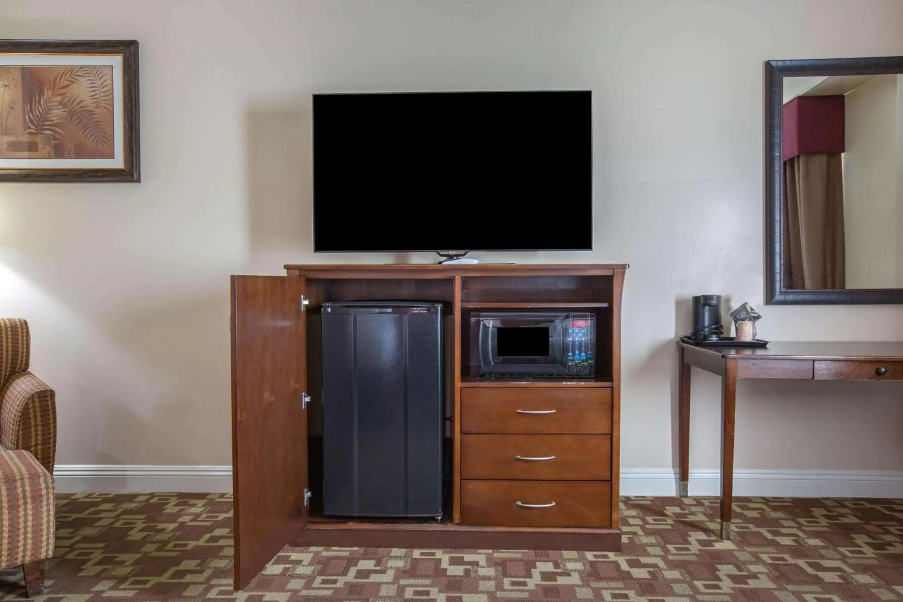 Photo of the whole room, TV/Entertainment Center in La Quinta by Wyndham Moreno Valley