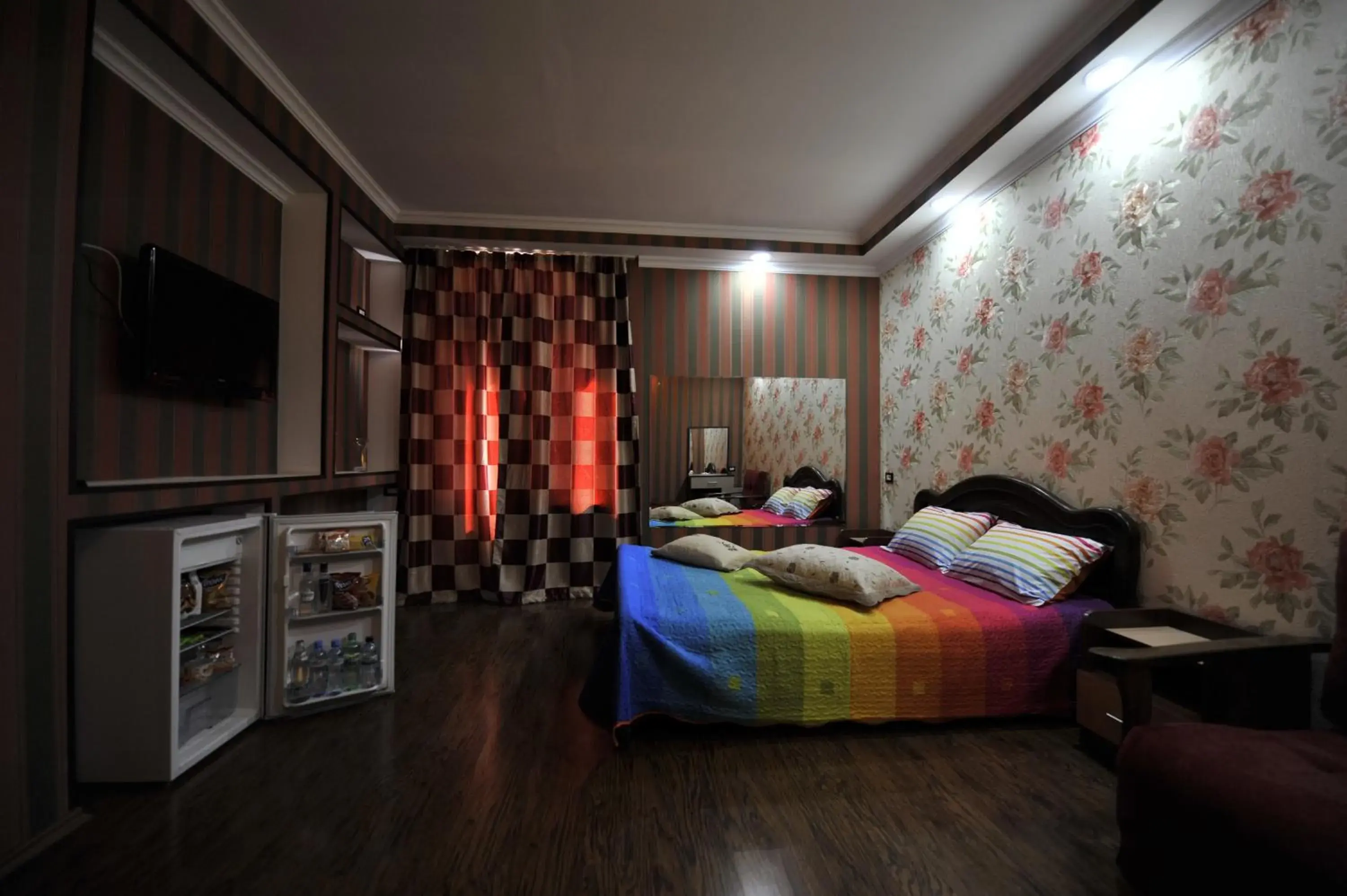 Communal lounge/ TV room in Dkd-bridge Hotel