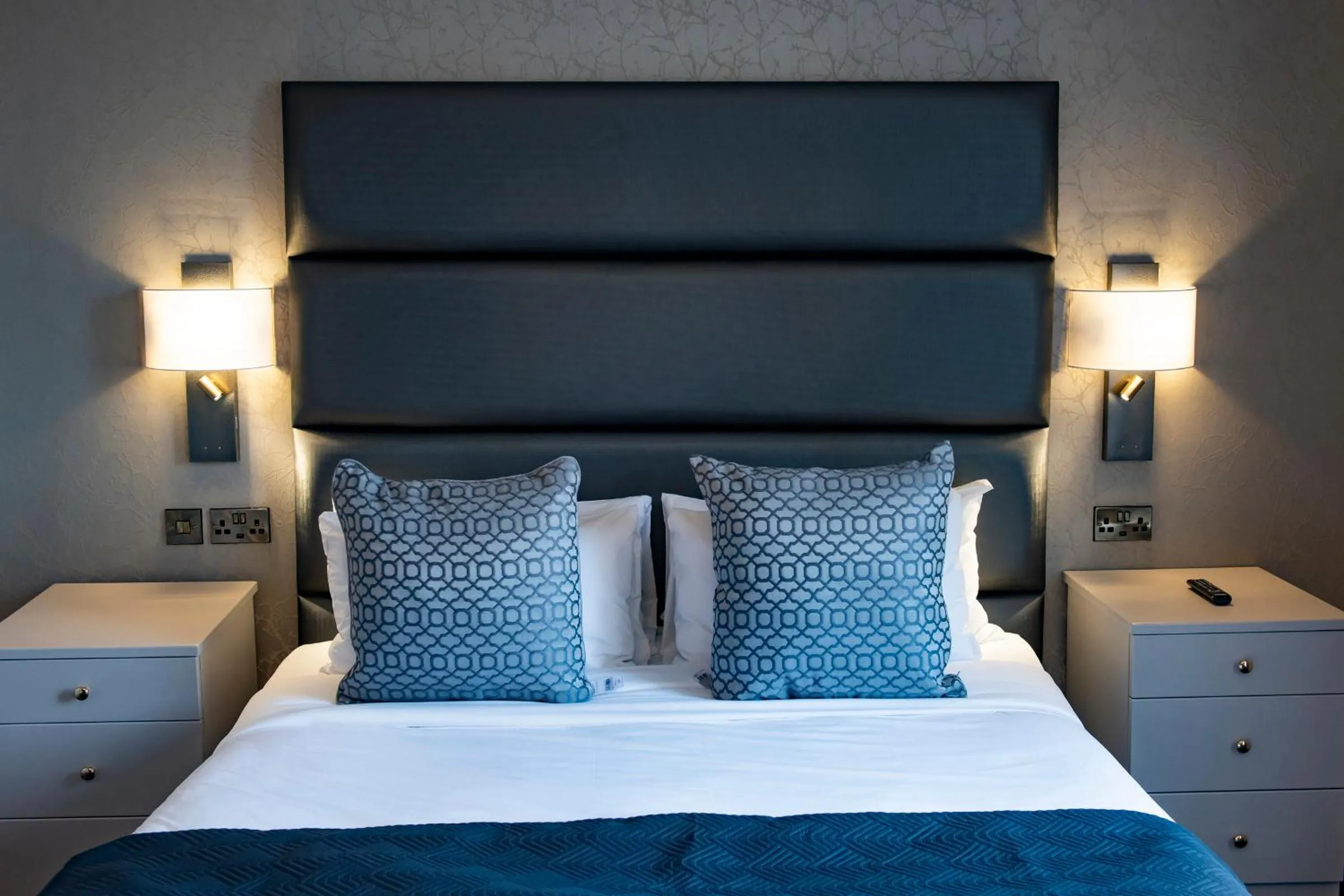 Bed in The Haycock Manor Hotel