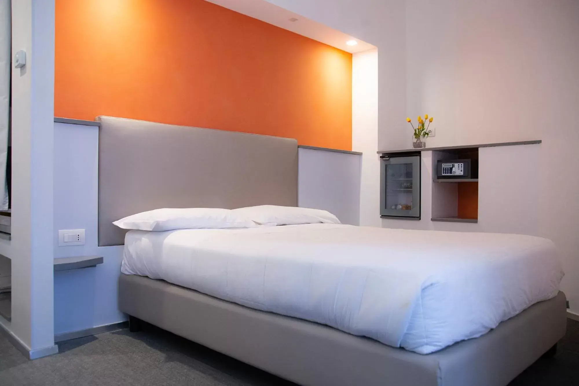 Bed in Executive Inn Boutique Hotel