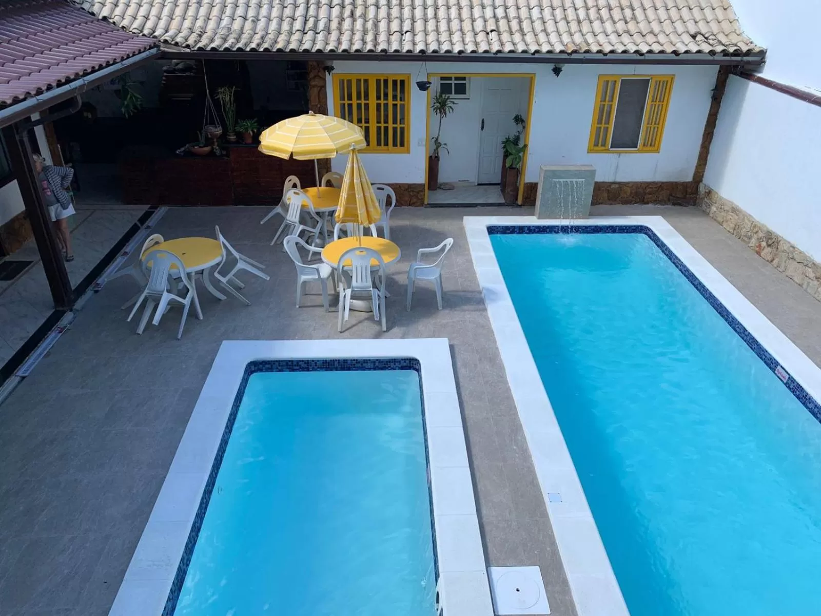 Swimming pool in Pousada Fazendinha Unamar