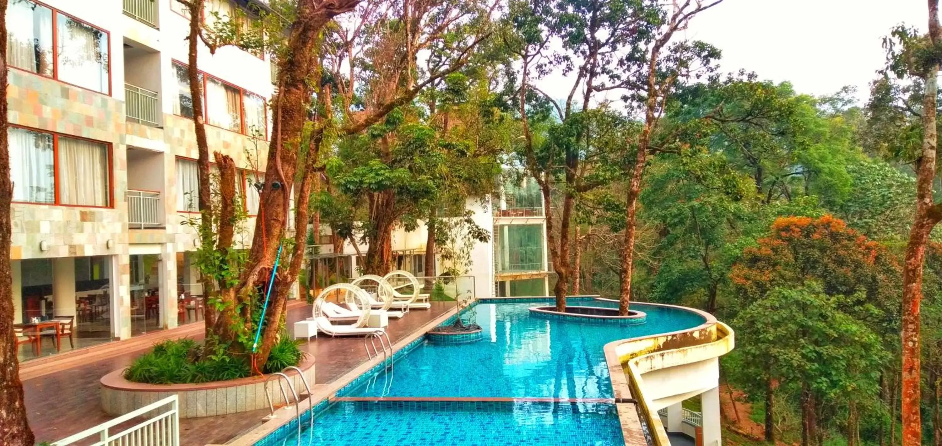 Natural landscape, Swimming Pool in Elixir Hills Suites Resort and Spa