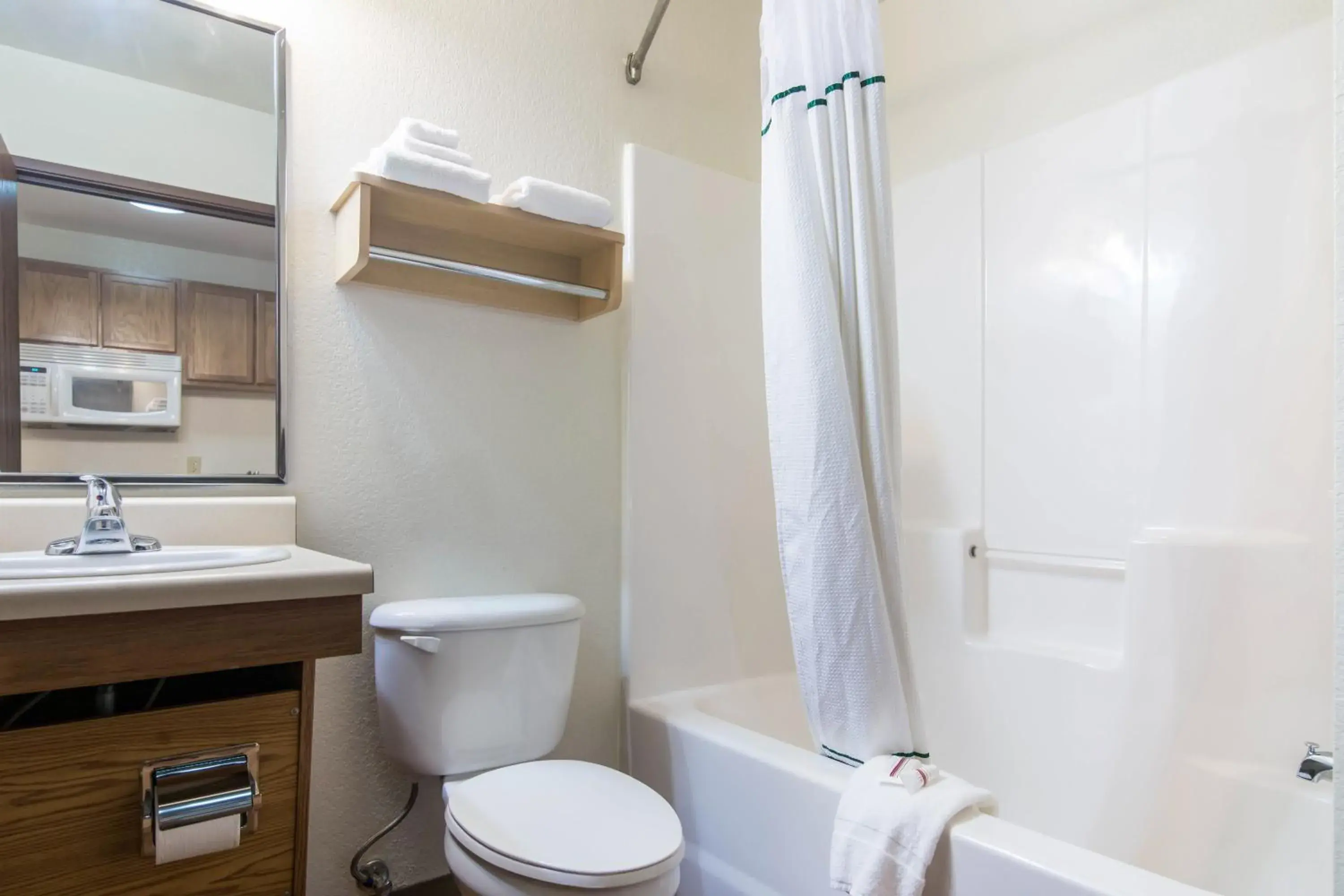 Photo of the whole room, Bathroom in HomeTowne Studios & Suites by Red Roof Bentonville