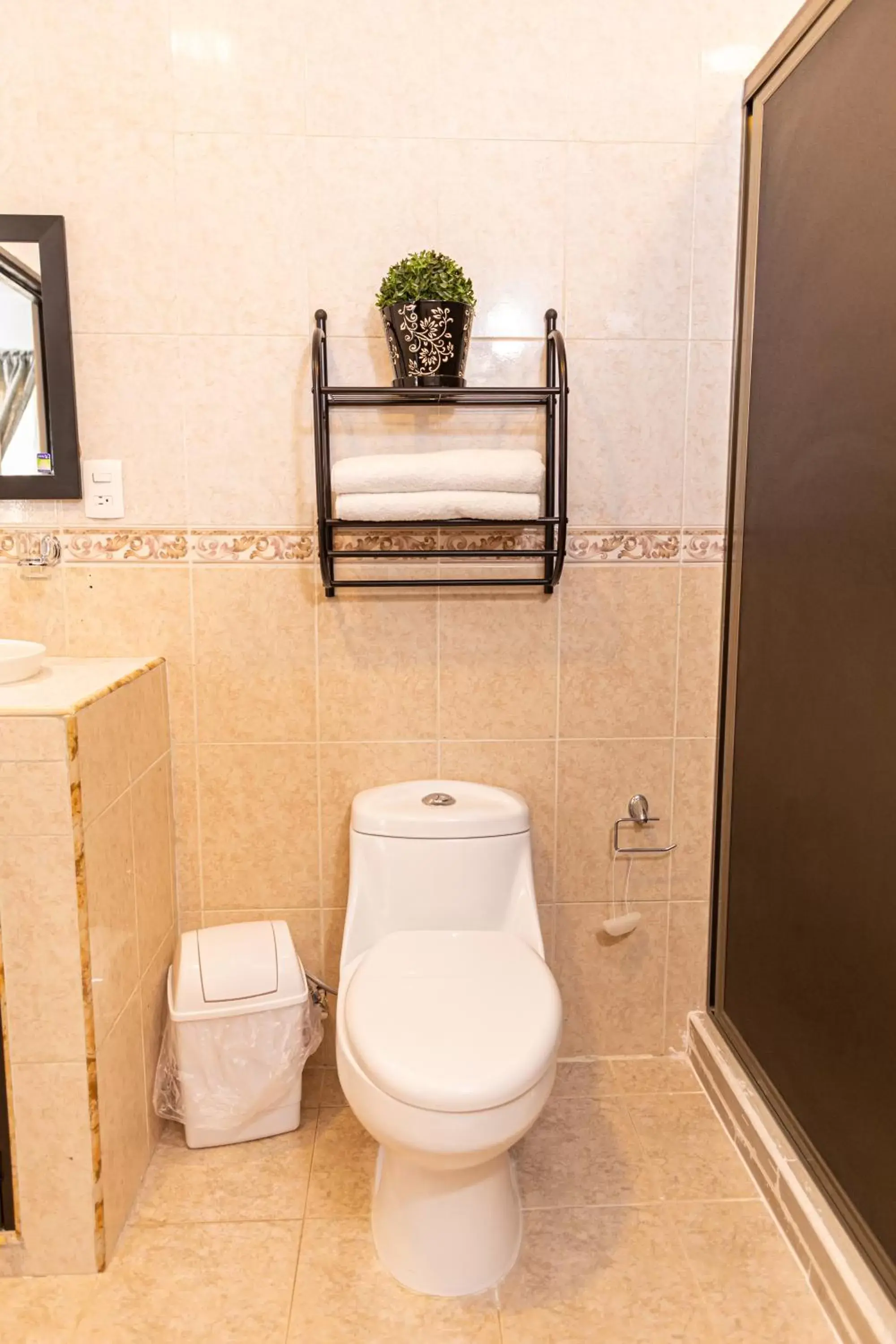 Bathroom in Santa Fe Studios And Suites