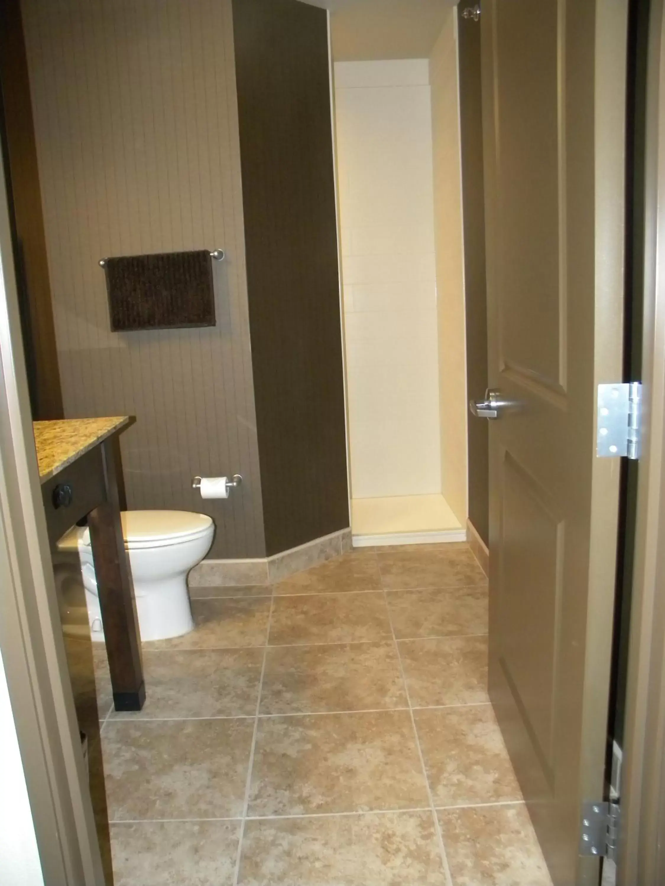 Toilet, Bathroom in Teddy's Residential Suites Watford City