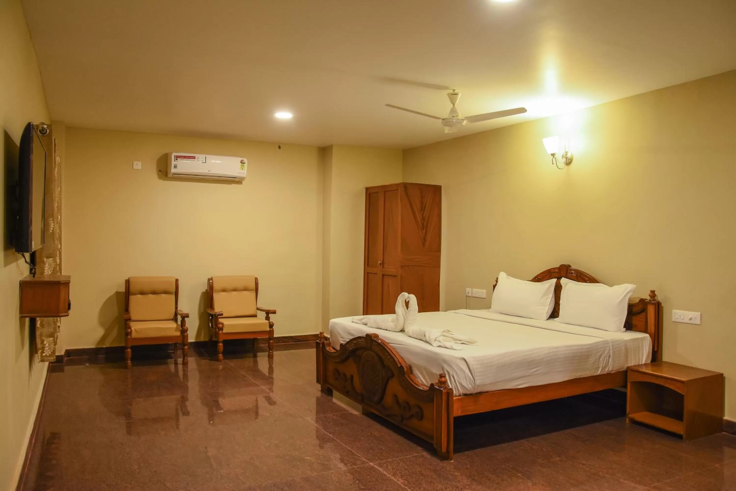 Bed in Poppys Tower Tiruppur