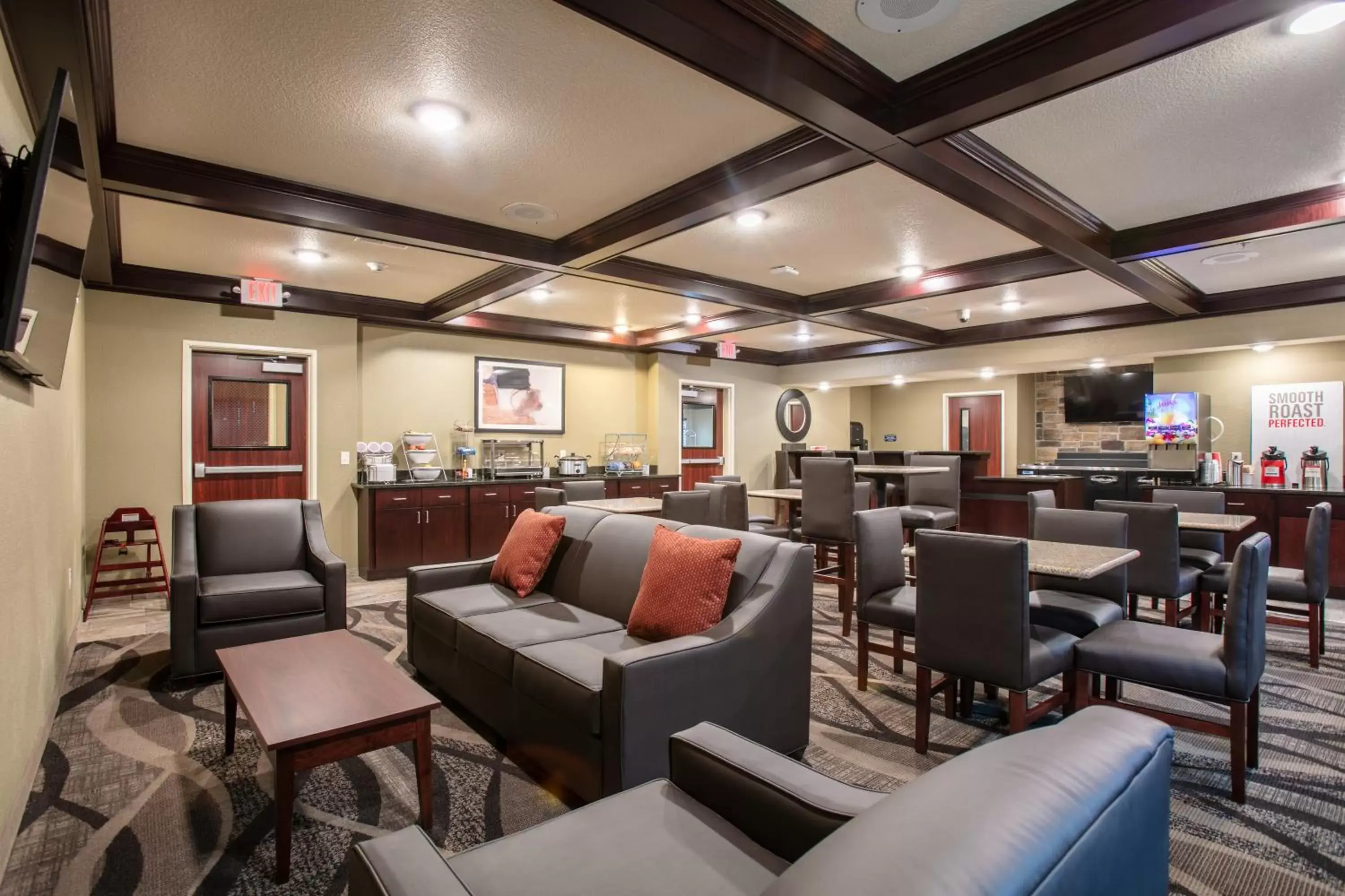 Communal lounge/ TV room in Cobblestone Inn & Suites - Pine Bluffs