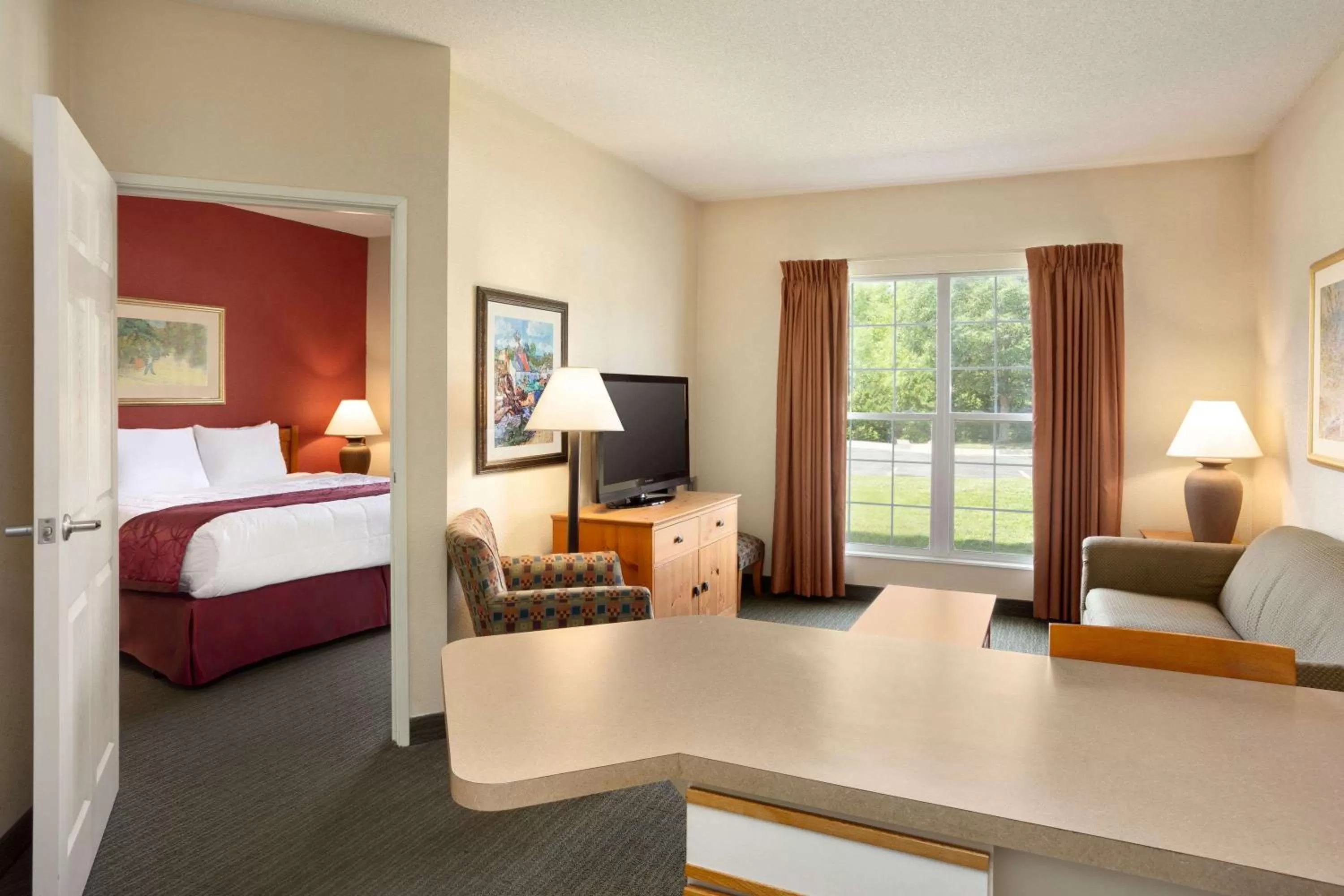 Photo of the whole room, Bed in Baymont by Wyndham Wichita East