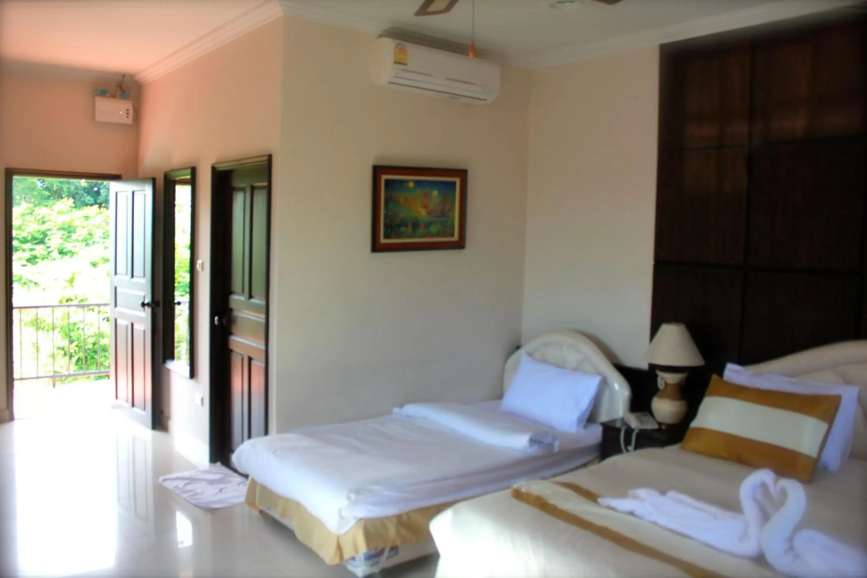Photo of the whole room, Bed in Serene Sands Health Resort