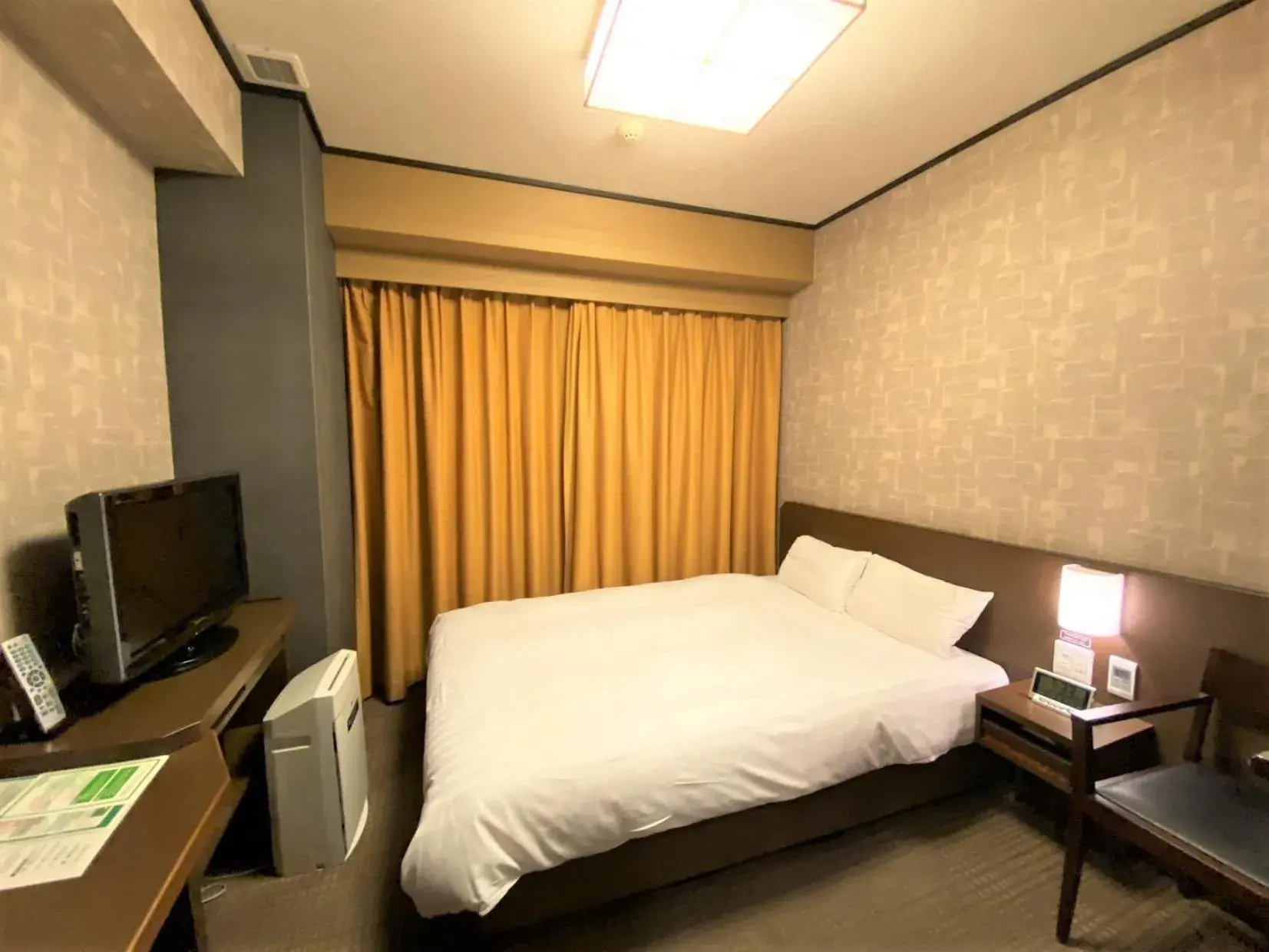 Bed in Natural Hot Spring Dormy Inn Premium Kyoto Ekimae