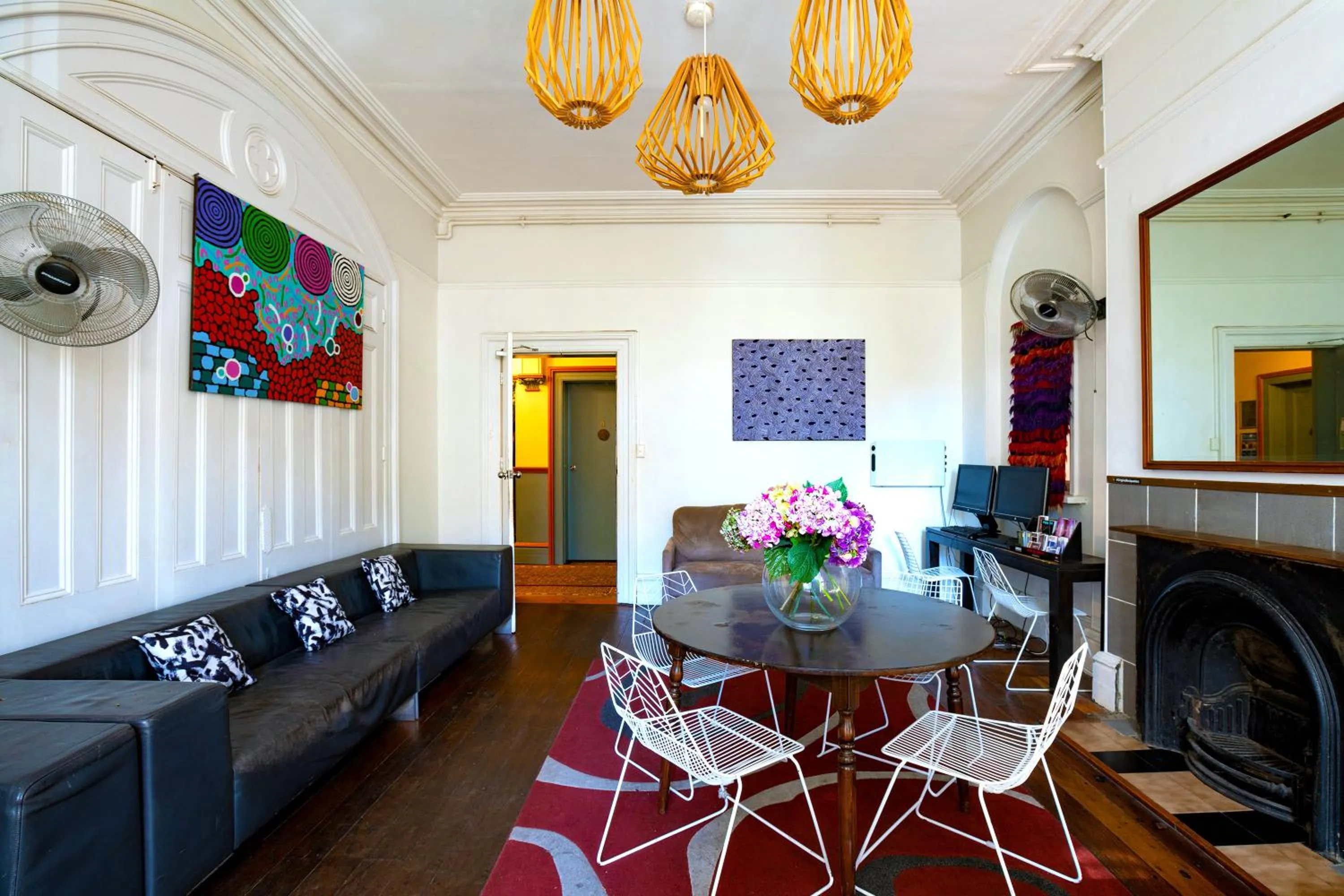 Communal lounge/ TV room in Original Backpackers