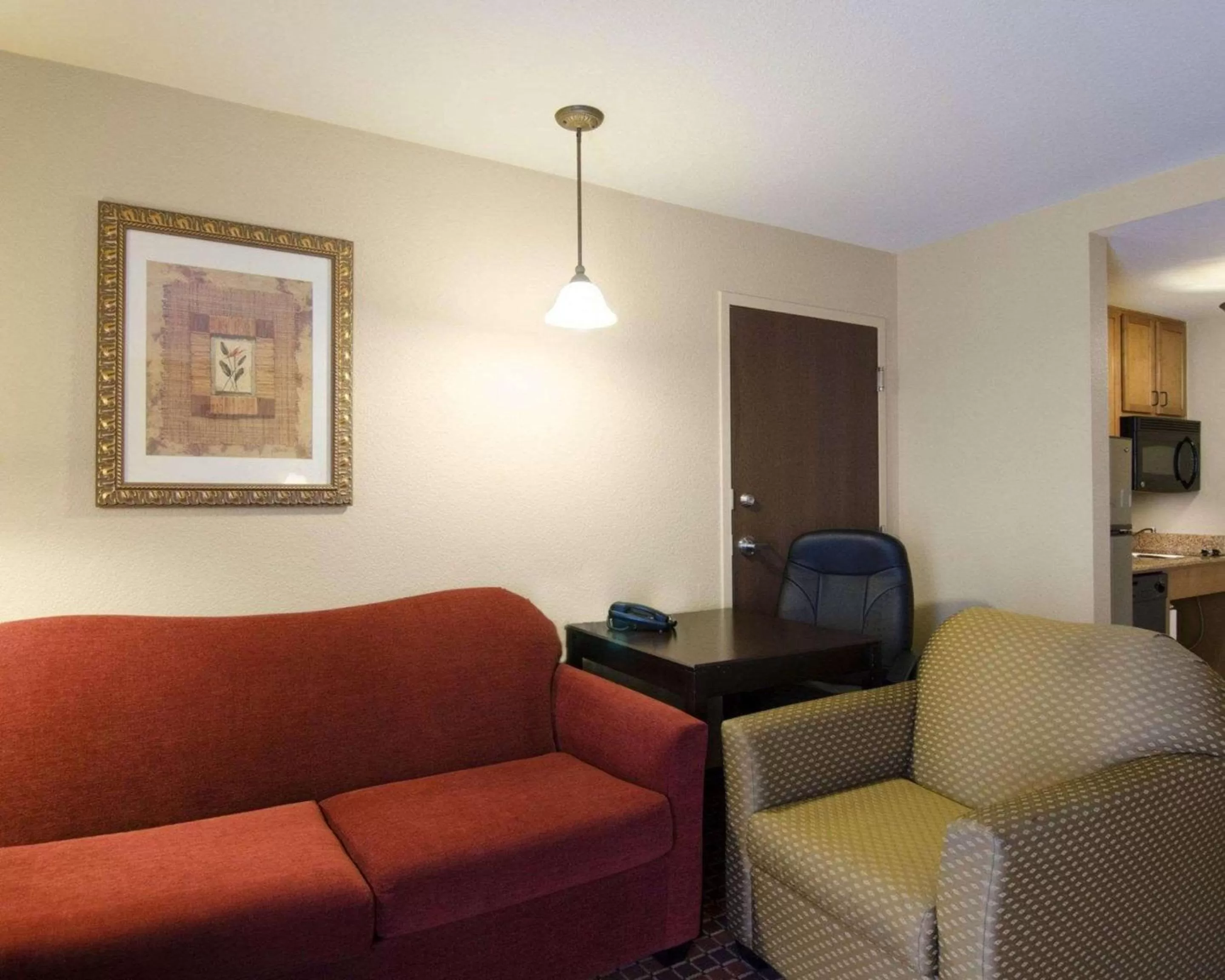 Photo of the whole room in Affordable Suites of America Rogers - Bentonville