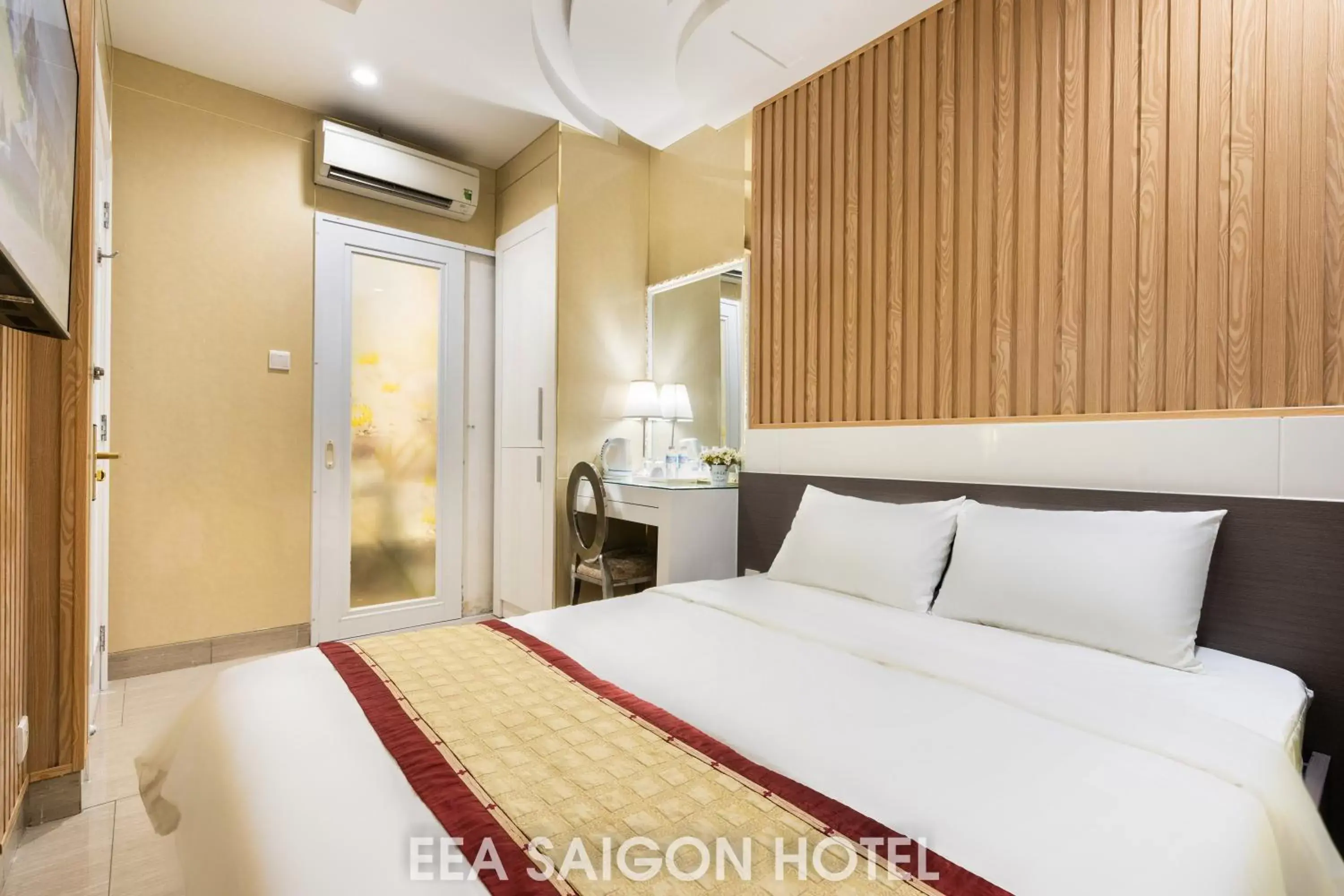 Bed in EEA Central Saigon Hotel