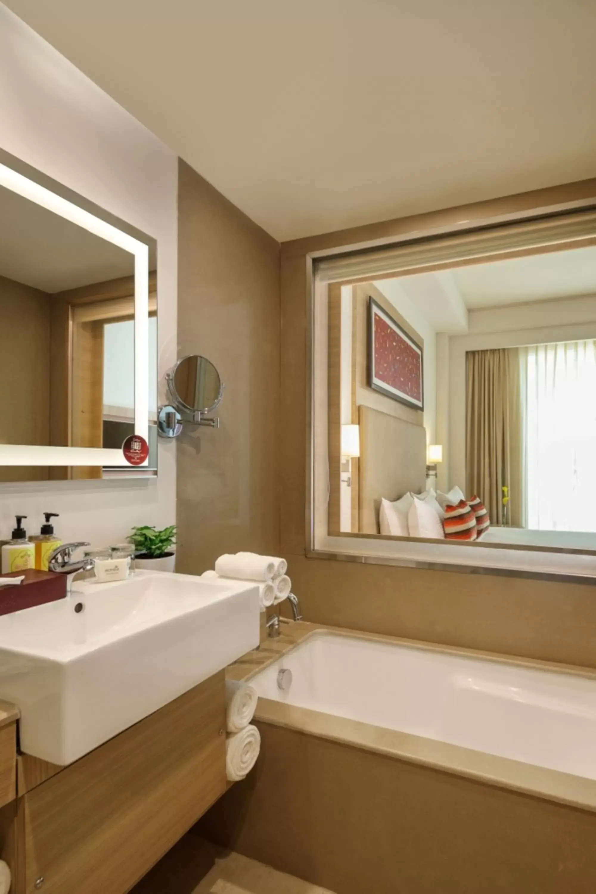 Bathroom in Sandal Suites by Lemon Tree Hotels