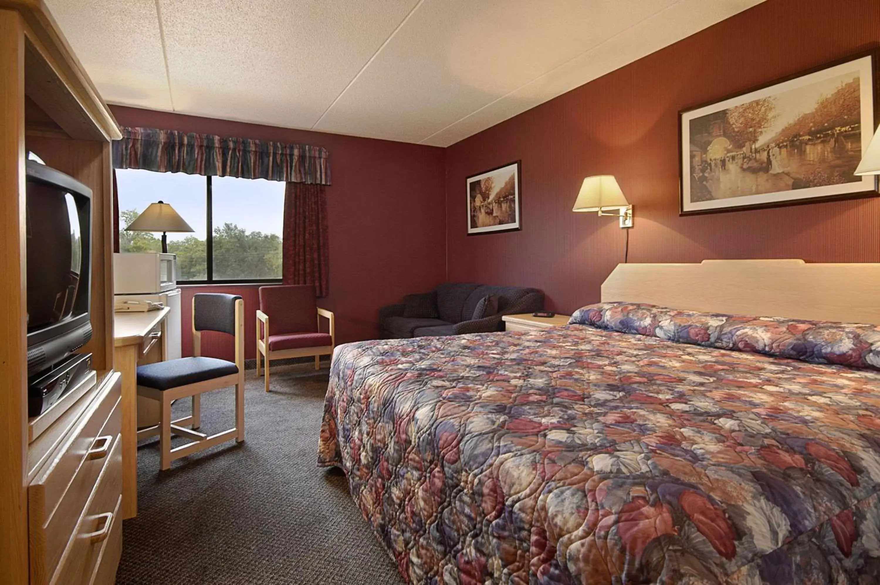 Photo of the whole room, Bed in Howard Johnson by Wyndham Portage La Prairie