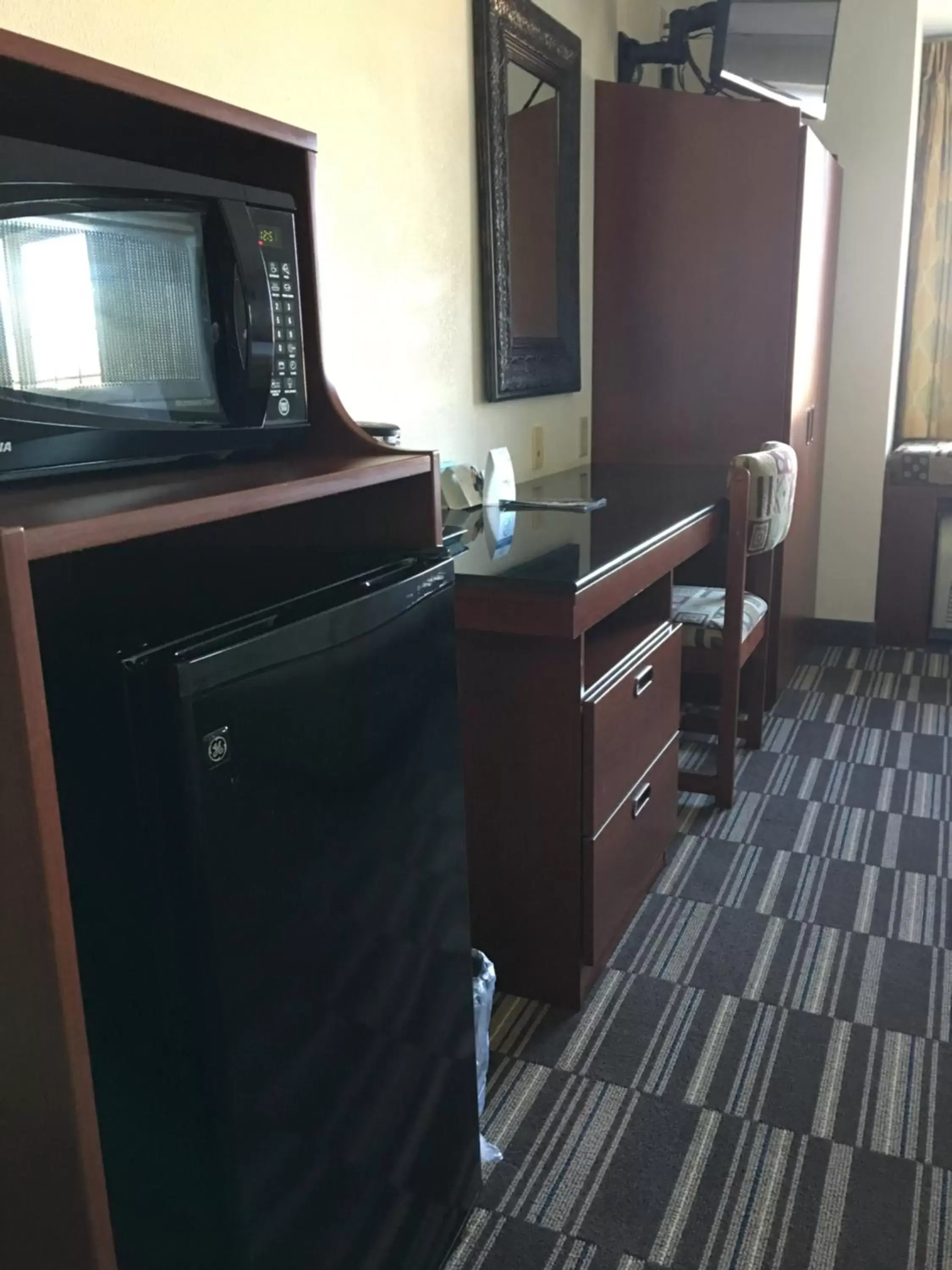 Photo of the whole room, TV/Entertainment Center in Microtel Inn & Suites by Wyndham Indianapolis Airport